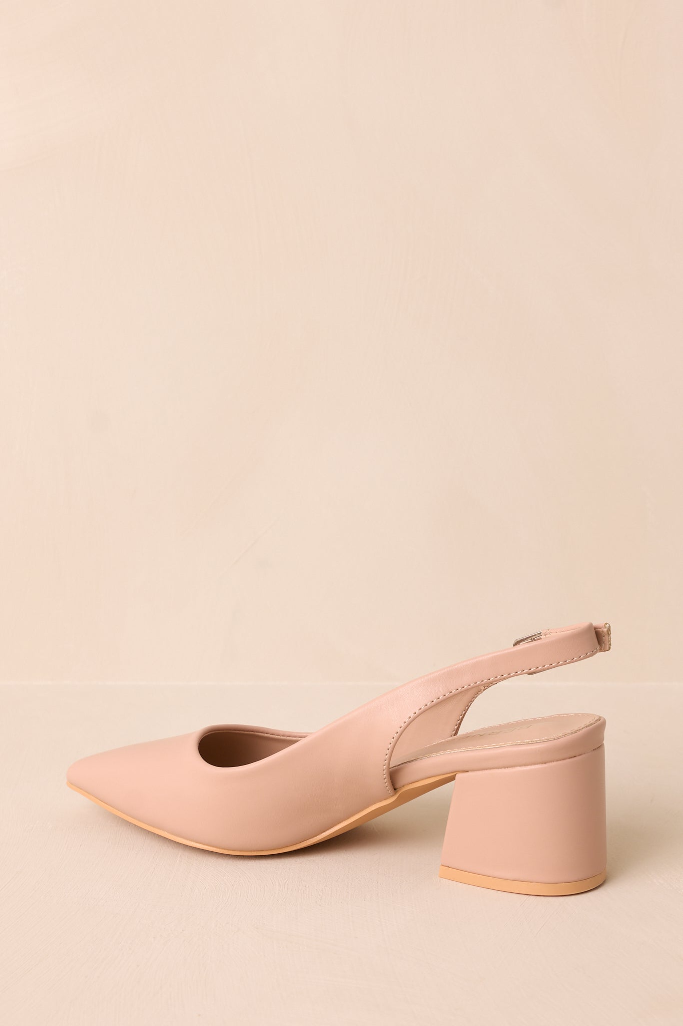 A slightly angled shot highlighting the thick heel and how it balances the structure of the shoe.
