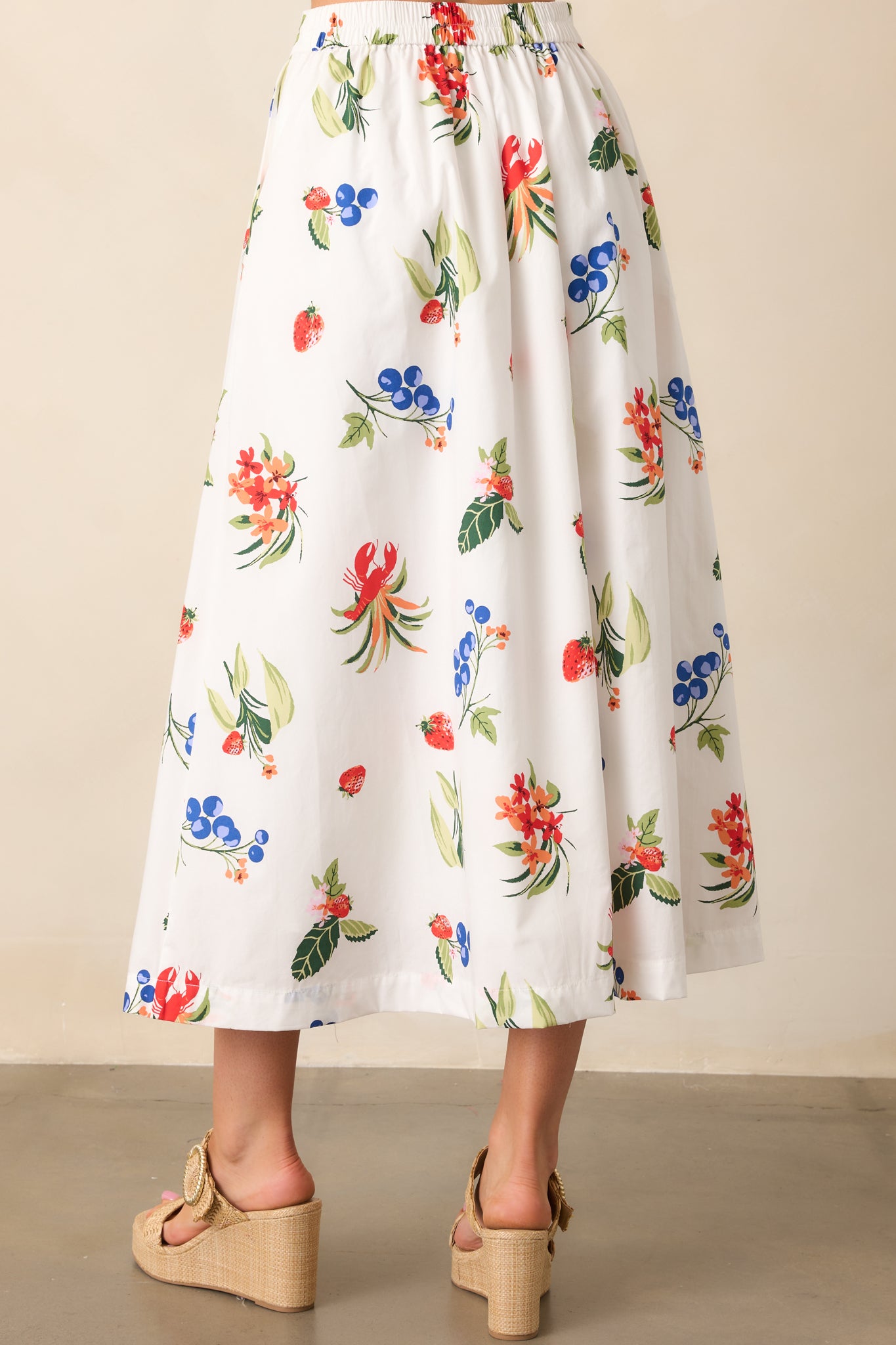 The back of the white skirt, complete with an elastic waist insert for an adjustable, easygoing fit.
