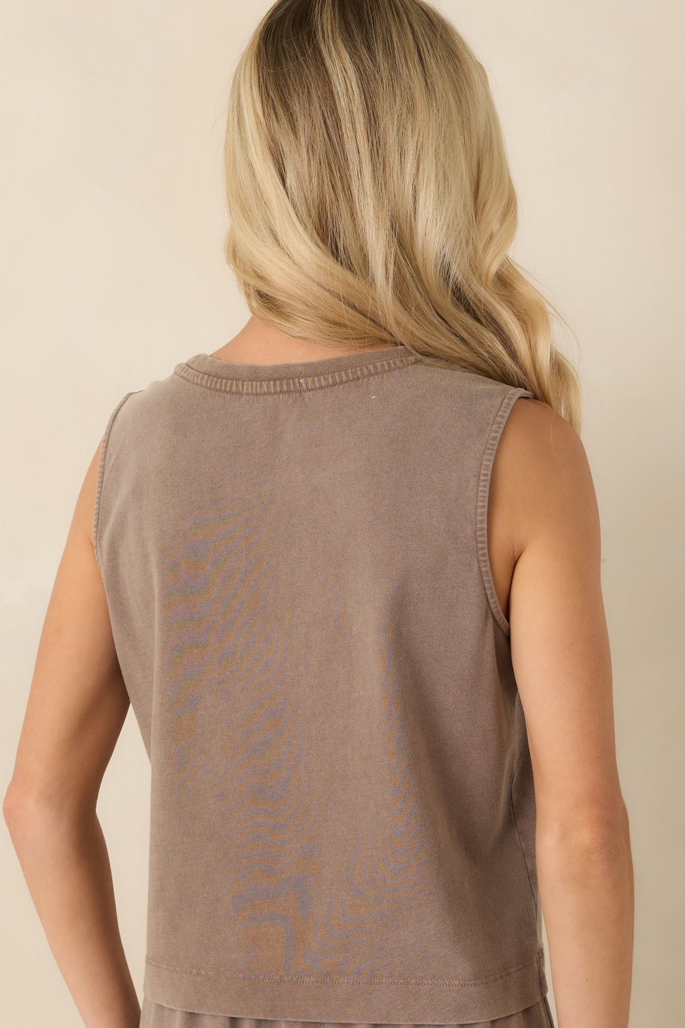 Back view of the dark taupe cotton tank featuring a sleeveless muscle tank cut, relaxed fit, and smooth jersey finish.
