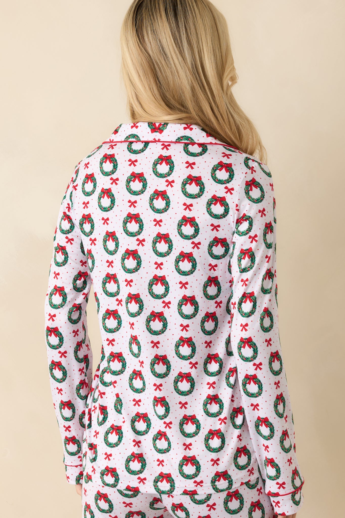 Back view of the pajama top showing the full back print, long sleeves, and relaxed fit.