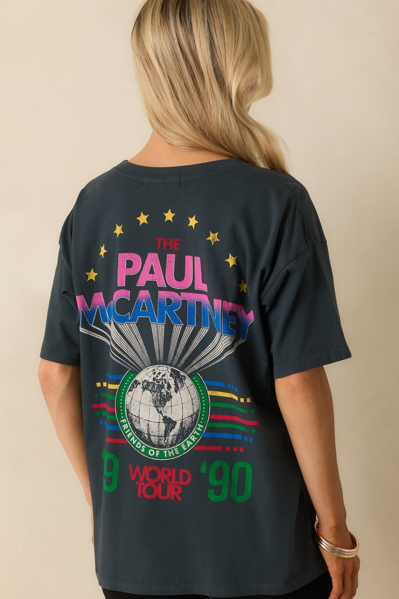 A back view of the tee showcasing its large and vibrant World Tour graphic.