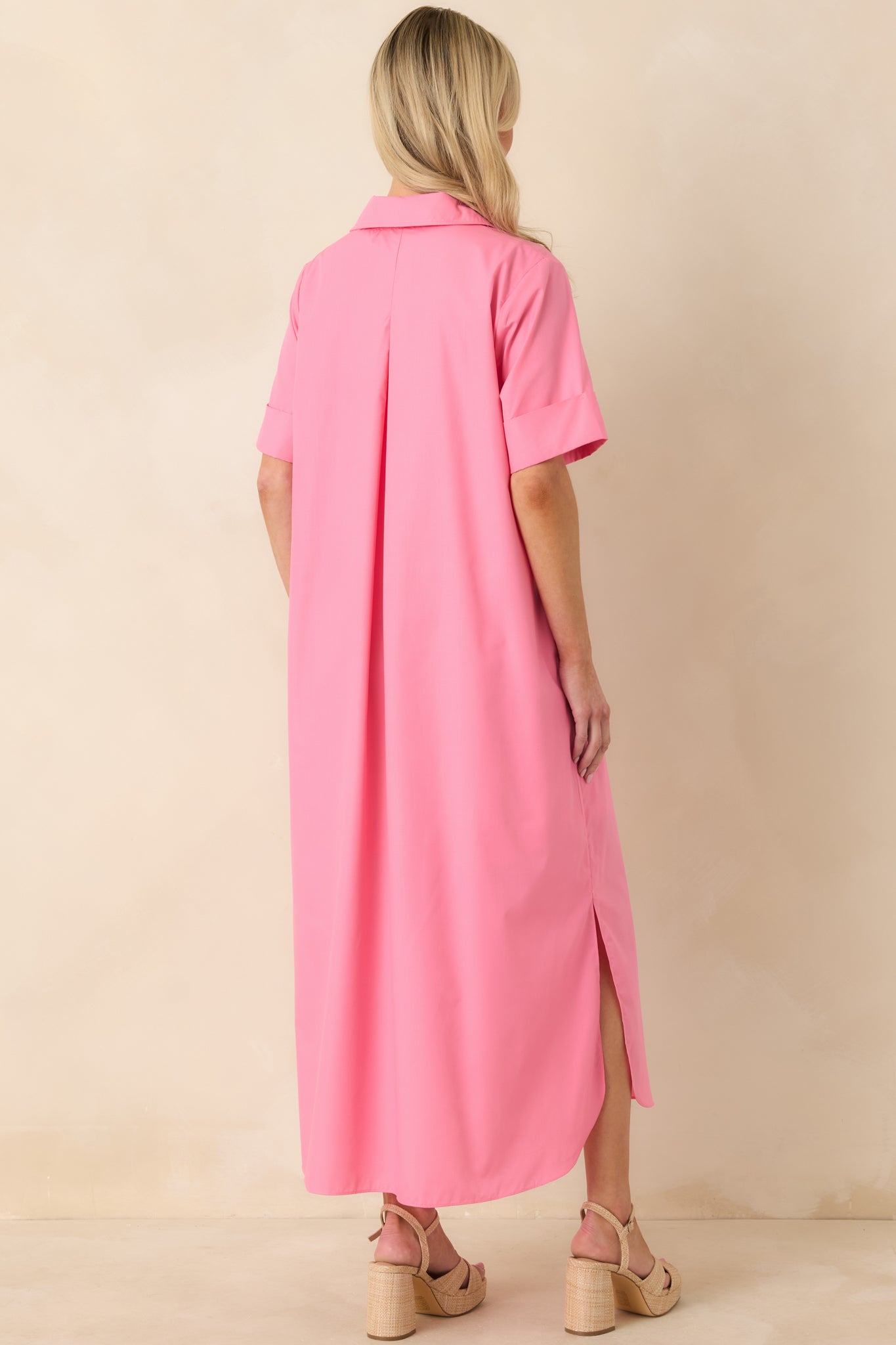 Back view of the pink maxi dress showing the clean back panel and uninterrupted maxi silhouette.