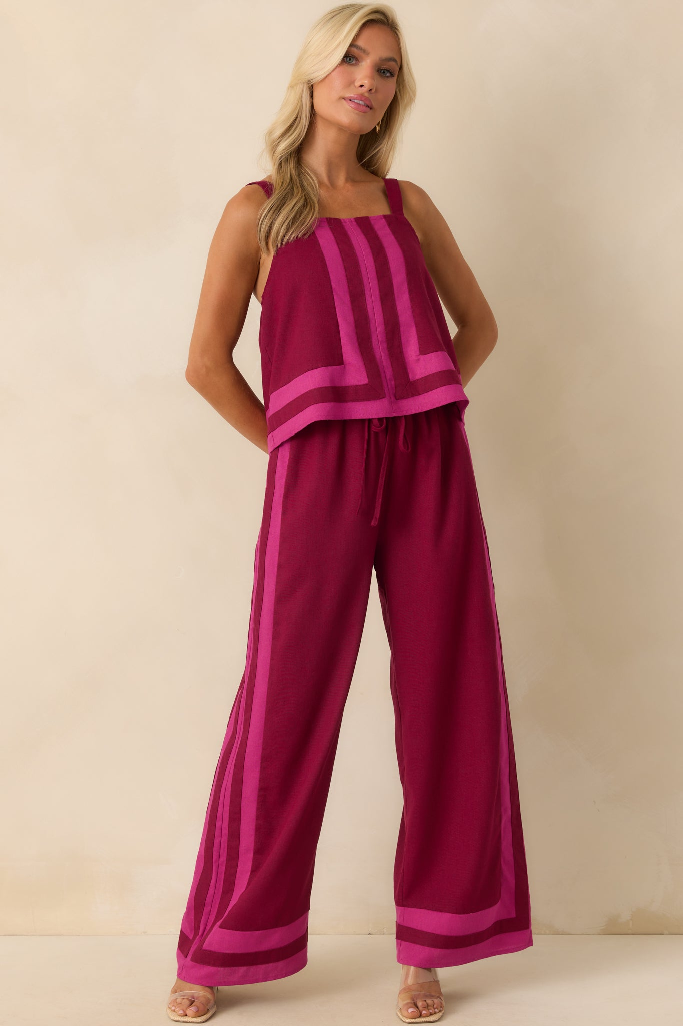 Front view of the berry pants highlighting the relaxed wide-leg fit, adjustable drawstring, and side pockets.