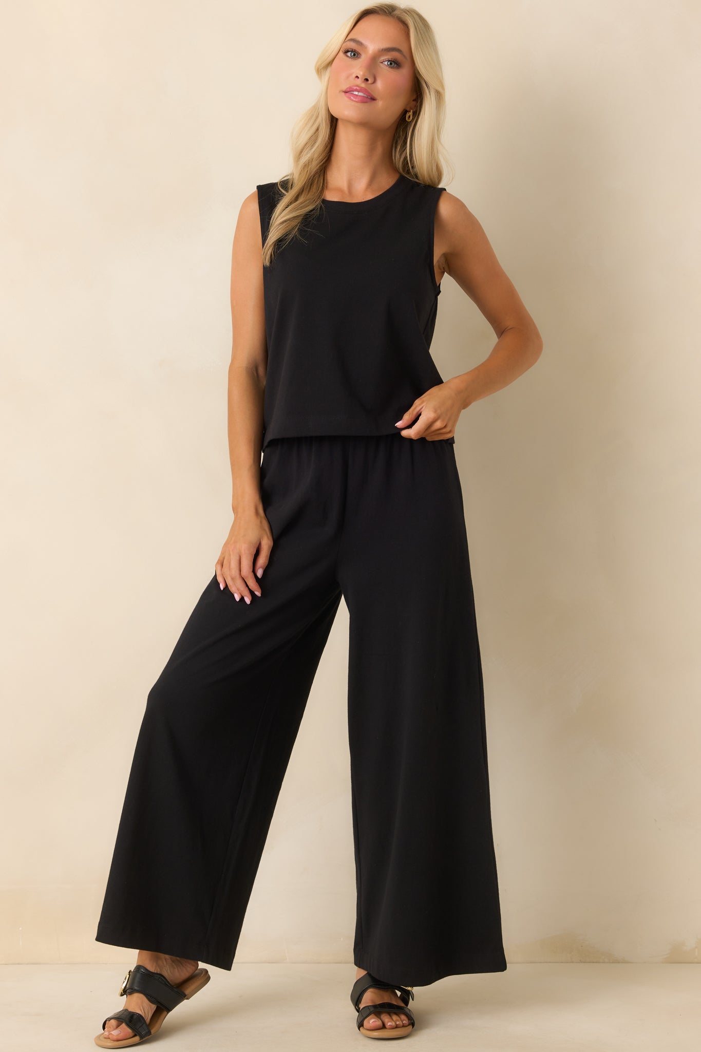 A front-facing full body view showing how the relaxed fit and crew neckline shape the top’s overall look.