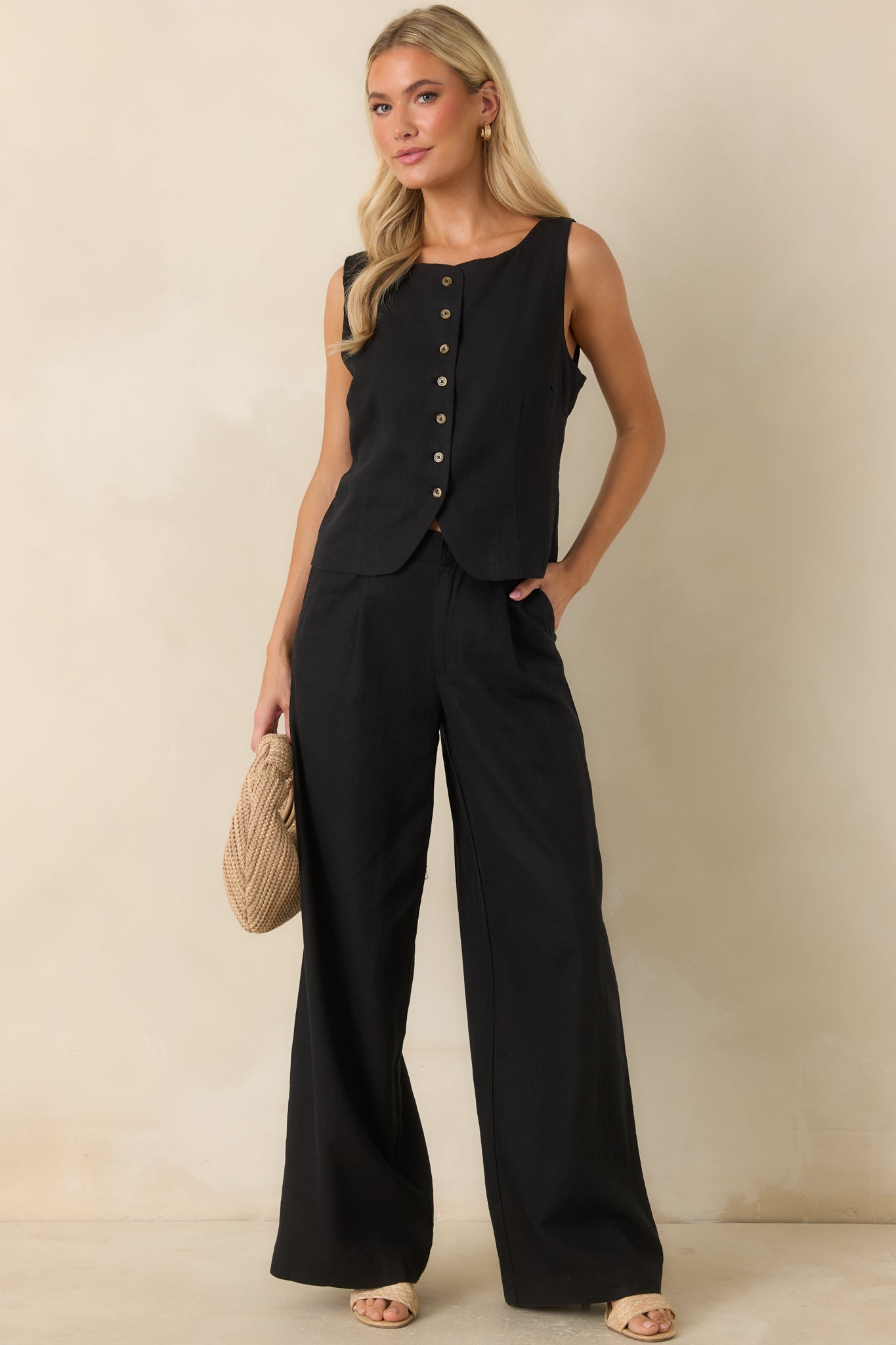 Lightweight black pants crafted from a washed linen blend with a full-length straight-leg silhouette and a polished tailored finish.