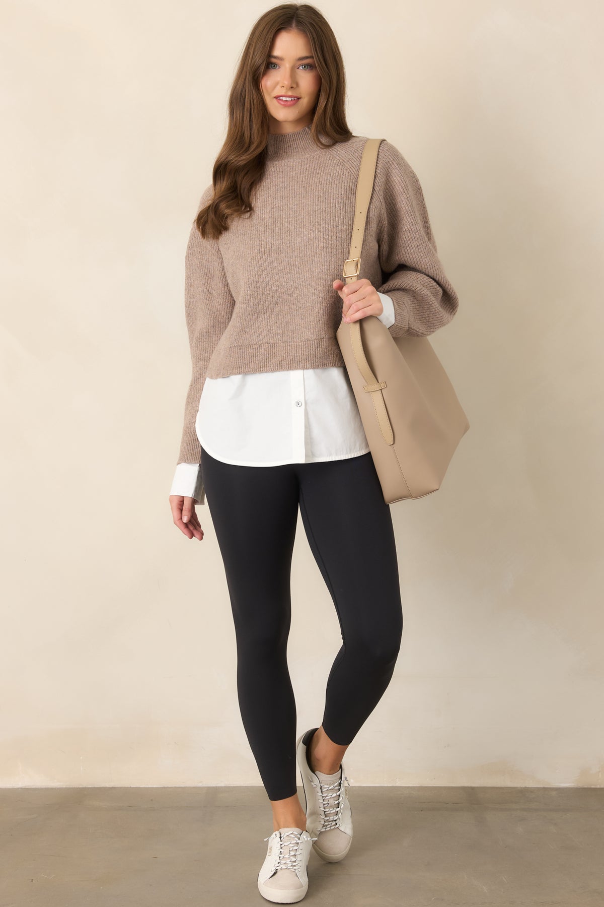 Black high-rise leggings showcasing a sculpted waistband, hidden pocket, and versatile 7/8-length design.