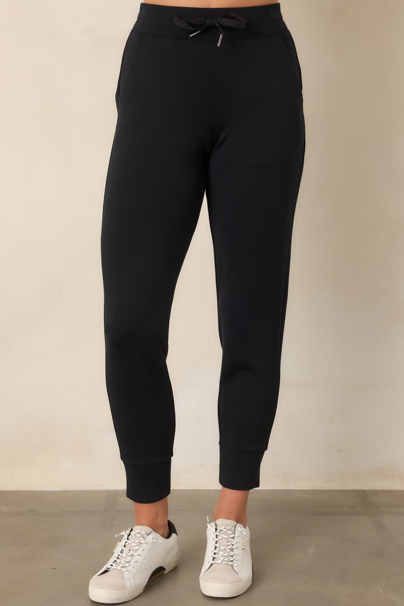 black jogger dress pants SPANX AirEssentials® Very Slim Cuff Color:Black-White color:ayana-opn-bck-mn-dress-medium-polka-brw swatch:https://www.motelrocks.com/cdn/shop/files/AYANA-OPN-BCK-MN-DRESS-MEDIUM-POLKA-BRW-5659D.jpg?v=1757903344&width=100 Selena boots or heels
