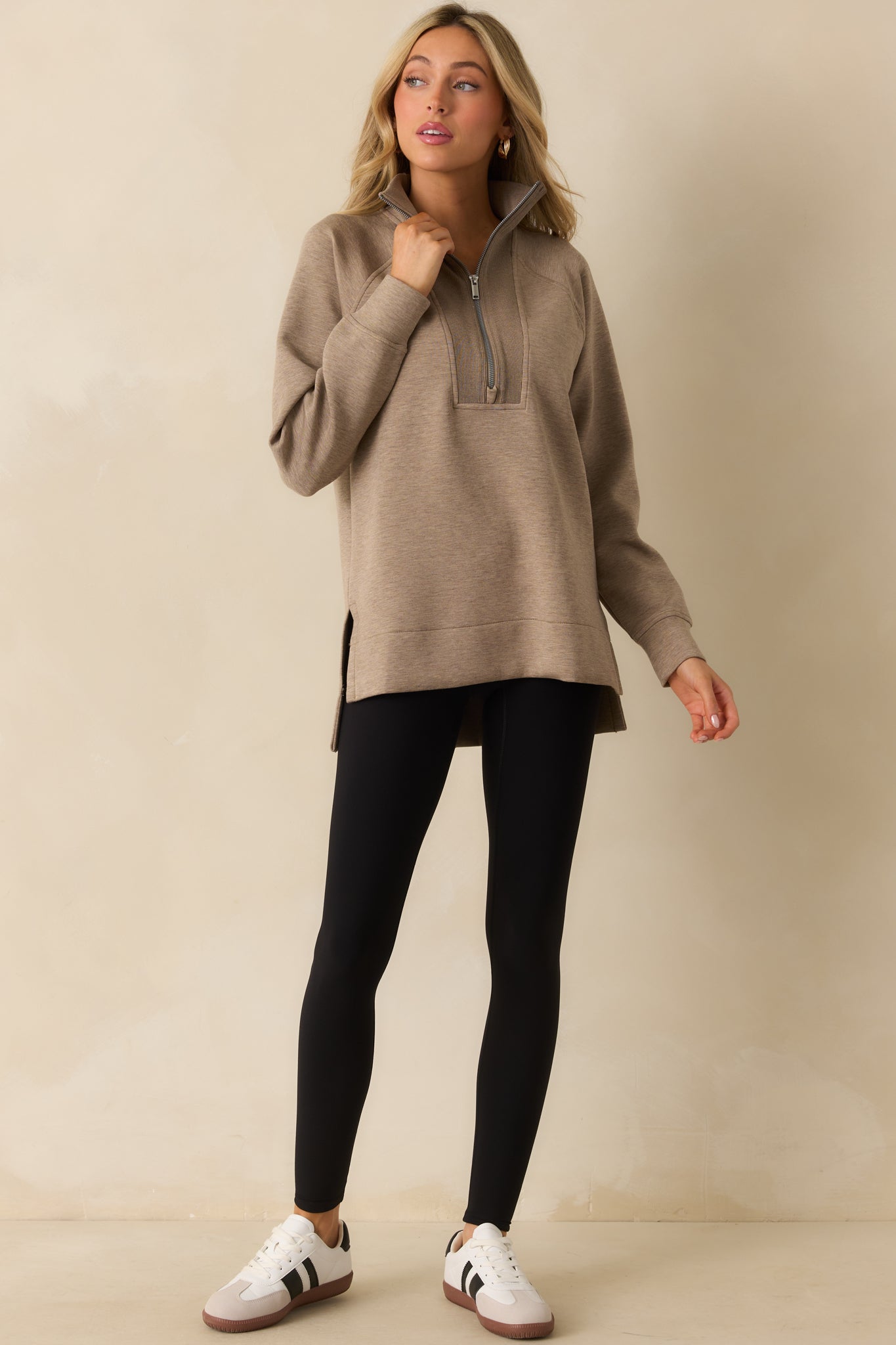 Black performance leggings designed for comfort and gentle mid-tummy shaping.