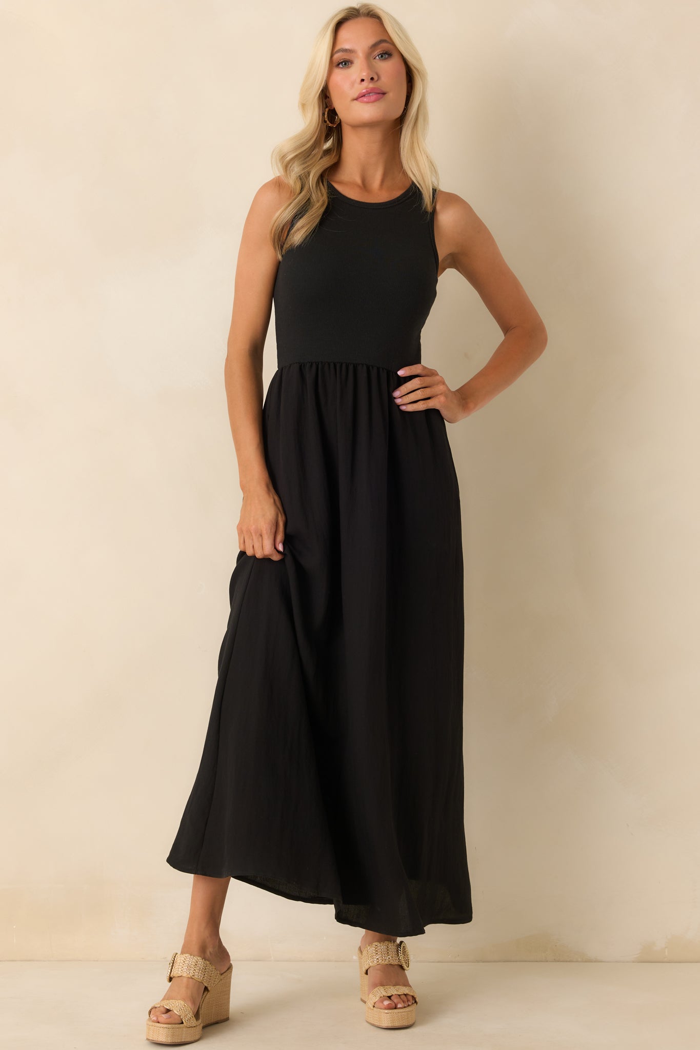 A front-facing shot emphasizing the relaxed drape of the skirt and the placement of the functional pockets.