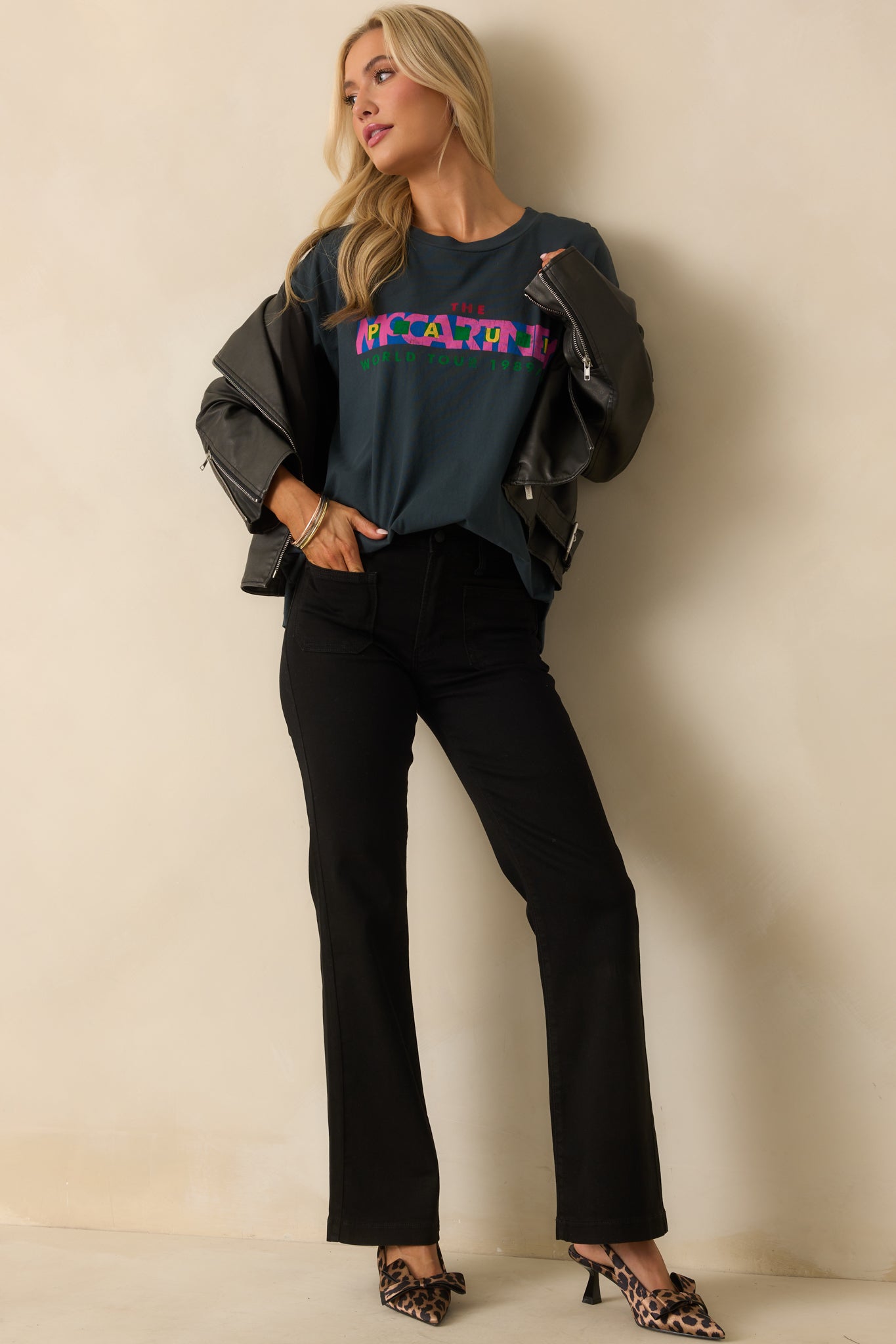 A full front view of the black tee featuring a bold “Paul McCartney” 1989 World Tour inspired graphic.