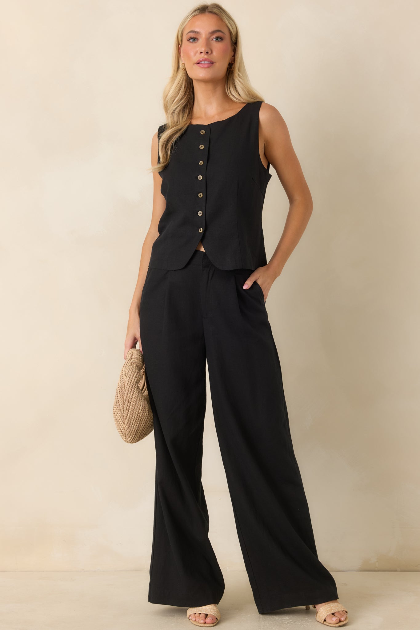 Black washed linen blend pants featuring a high-rise waist, straight-leg silhouette, and full-length design for a timeless look.