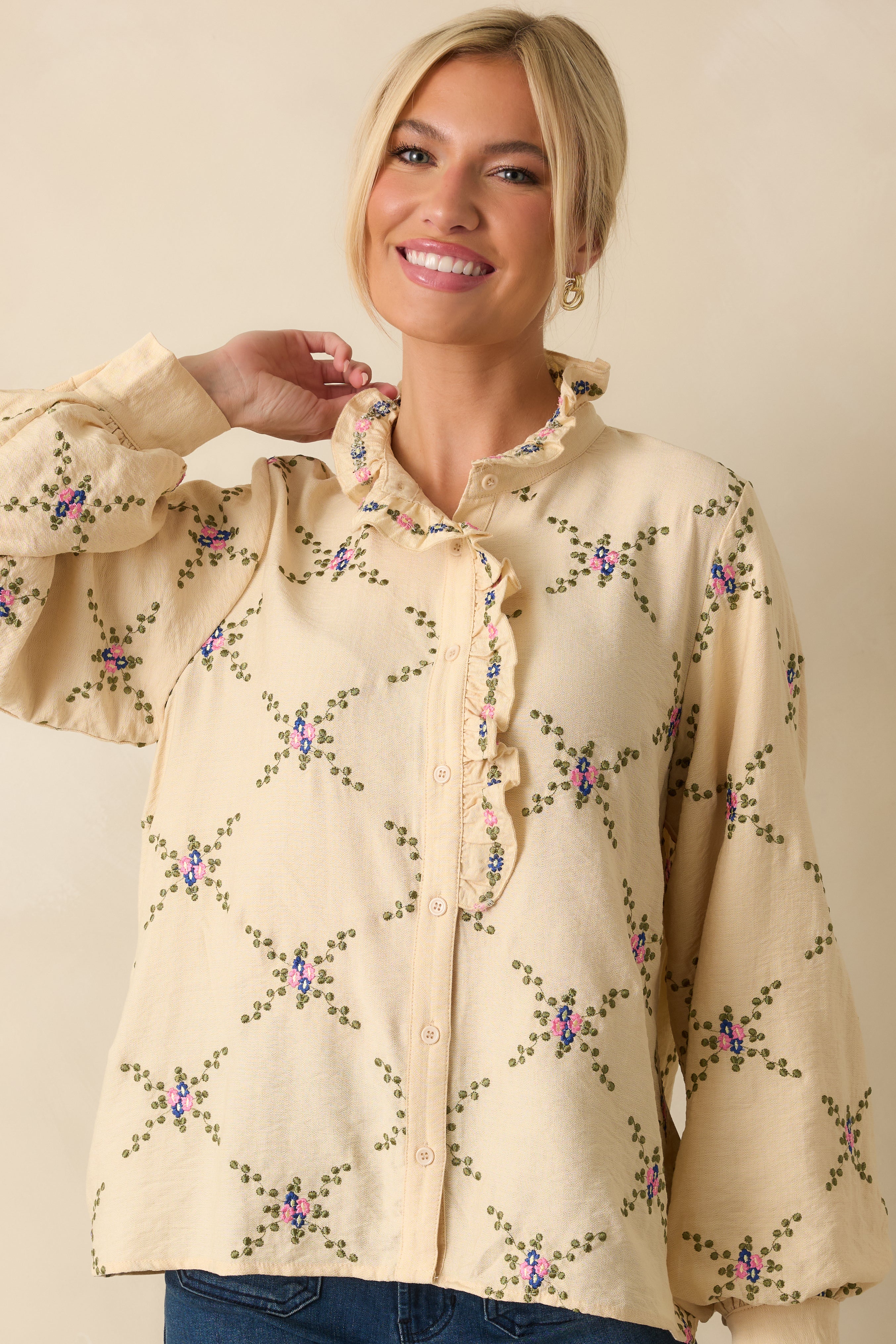 Front view highlighting the embroidery along the neckline and upper chest area.
