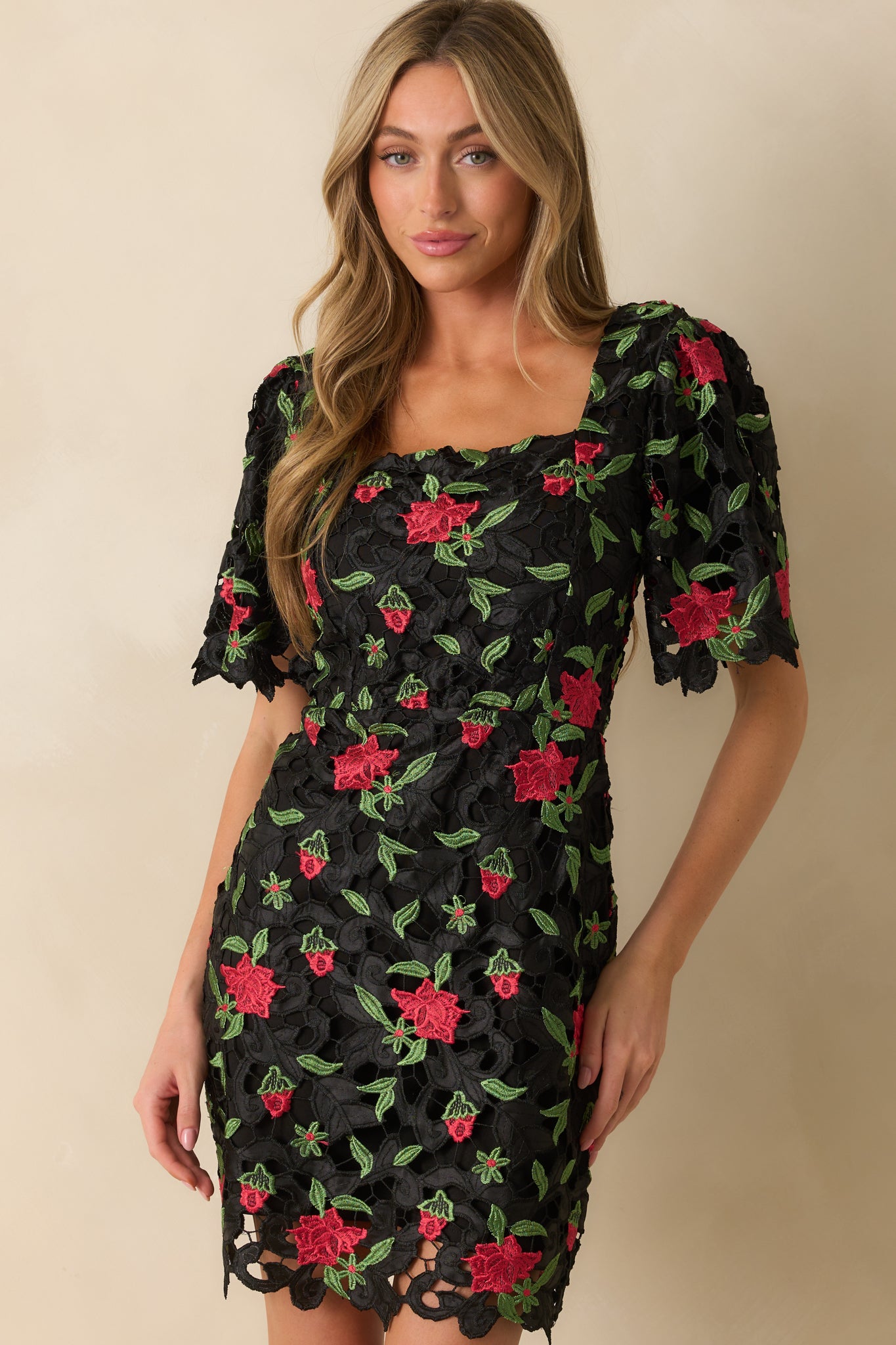 Focus on the bodice showing lace texture layered over black lining.