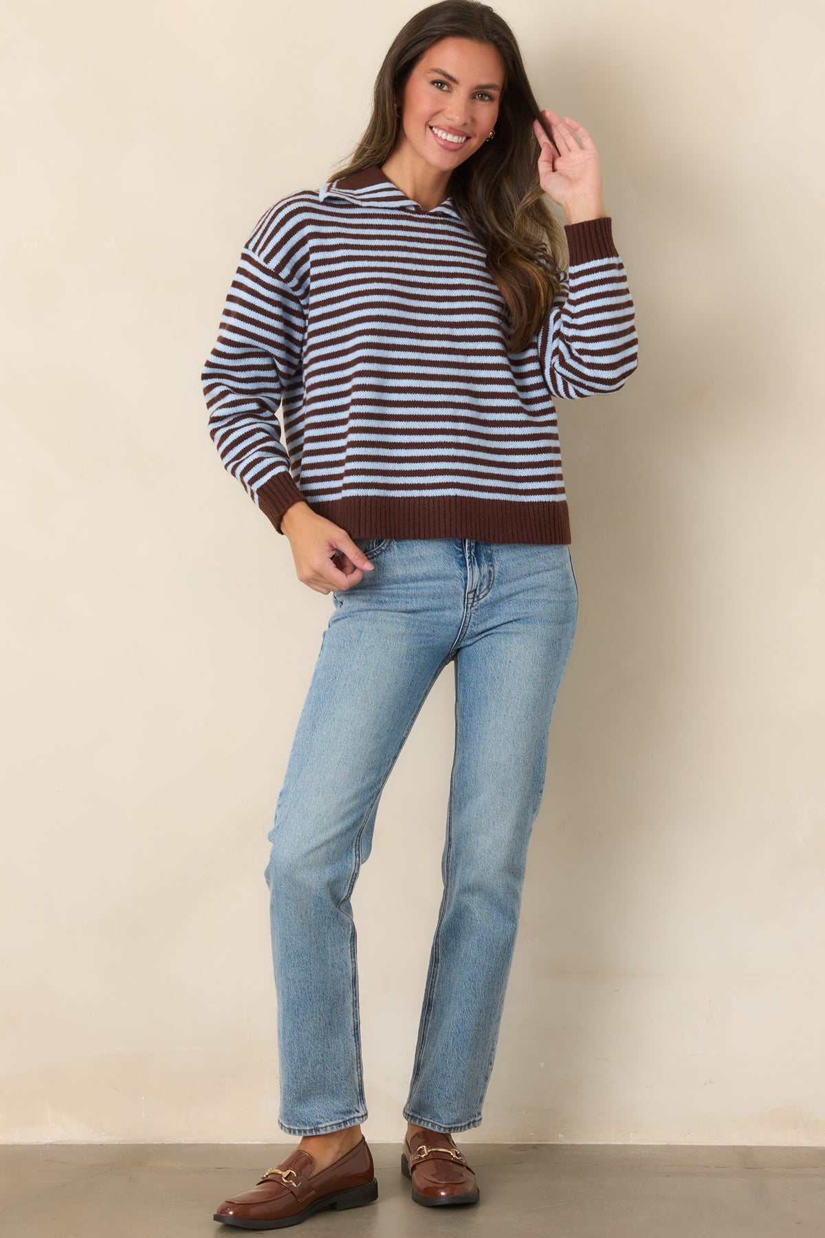Slightly boxy striped top finished with a classic collar and chocolate brown ribbed hem.