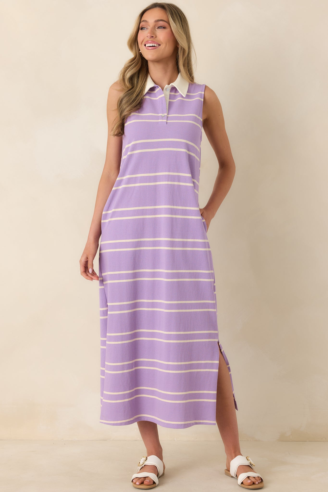 Breathable cotton dress with neutral stripe detailing, crisp collar contrast, and a clean, streamlined fit.