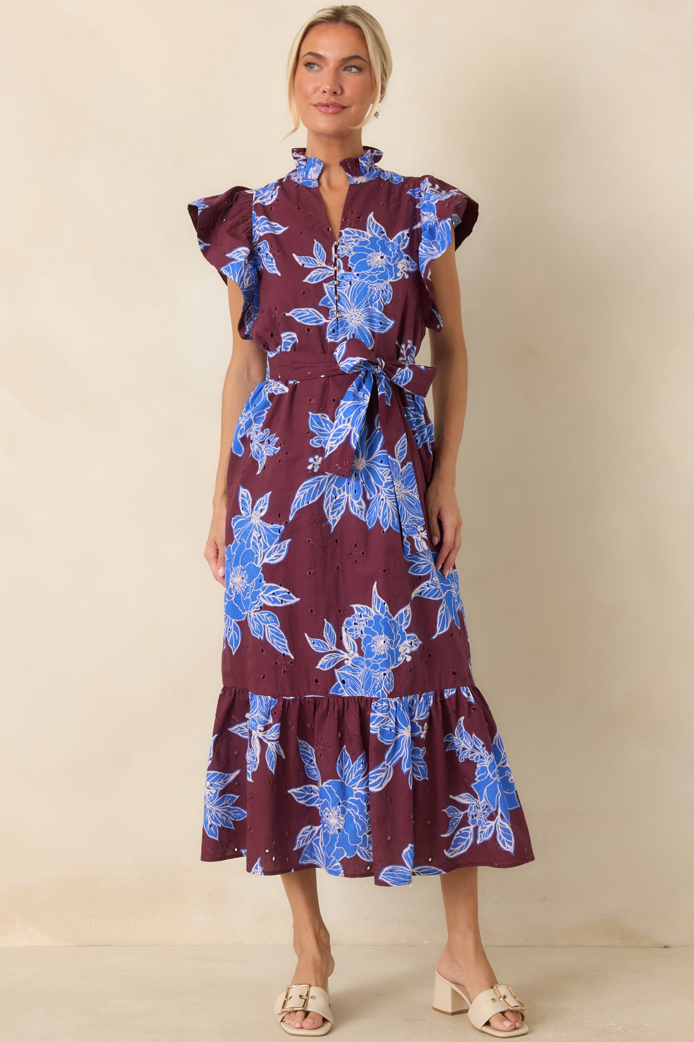 Breathable cotton dress featuring flutter sleeves, side pockets, and a tiered ruffle hem that moves beautifully with every step.