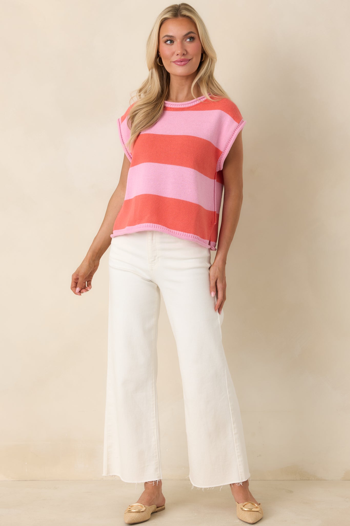 Breathable striped top with cap-style sleeves and classic shape.