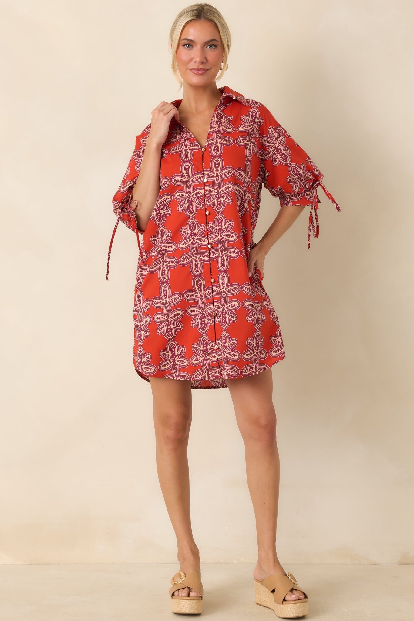 Brick red and burgundy cotton mini shirt dress featuring a vintage-inspired print, collared neckline, button-front placket, and puff sleeves.
