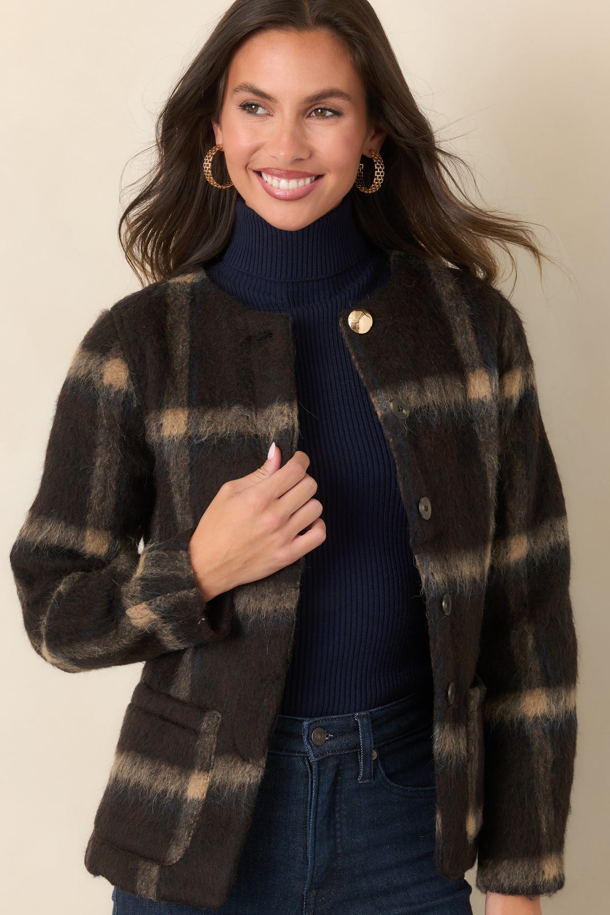 Brushed wool-blend jacket with a refined waist shape and subtle navy plaid accents.