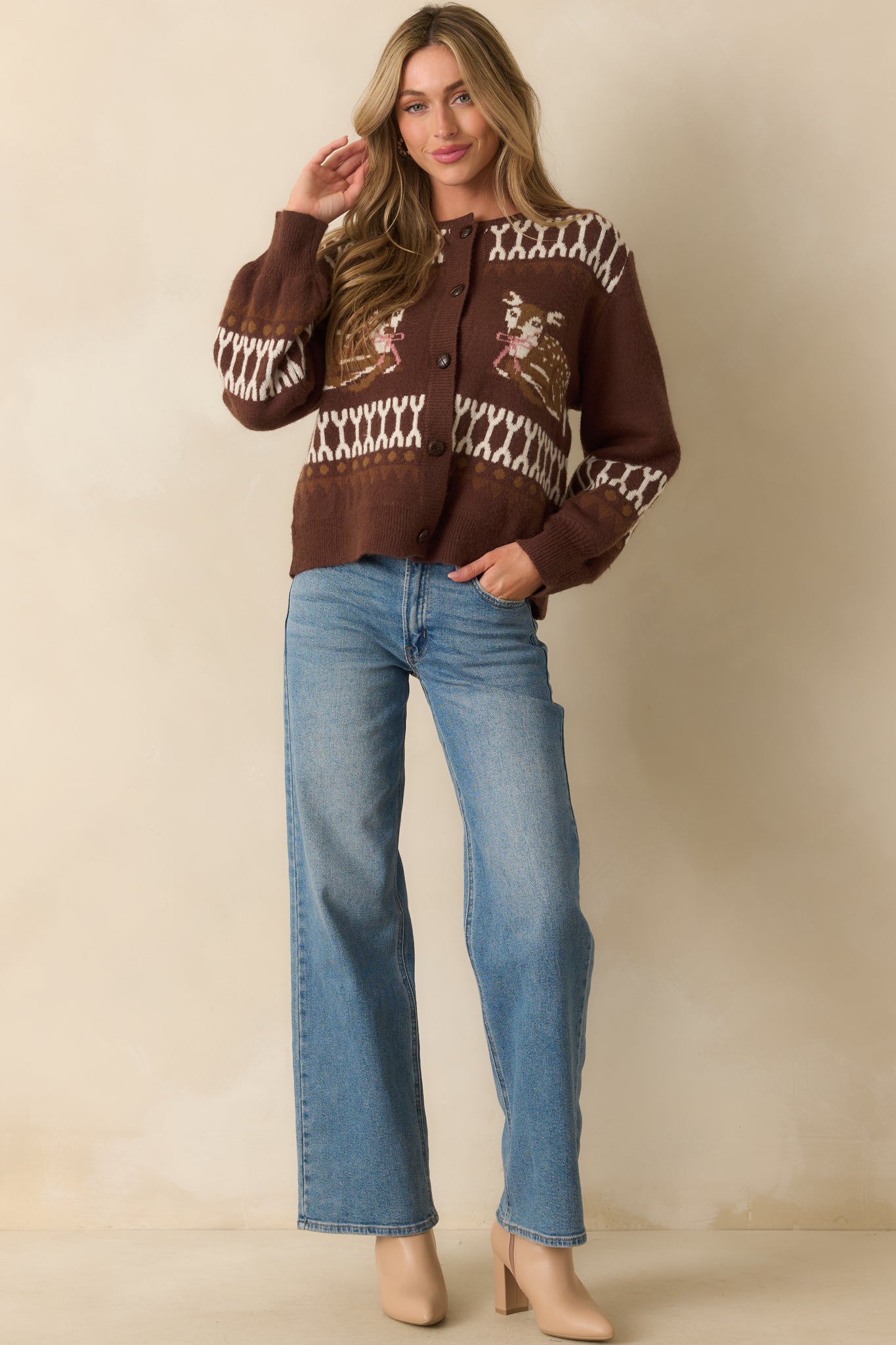 Geometric intarsia knit brown cardigan with classic long sleeves and ribbed cuffs.