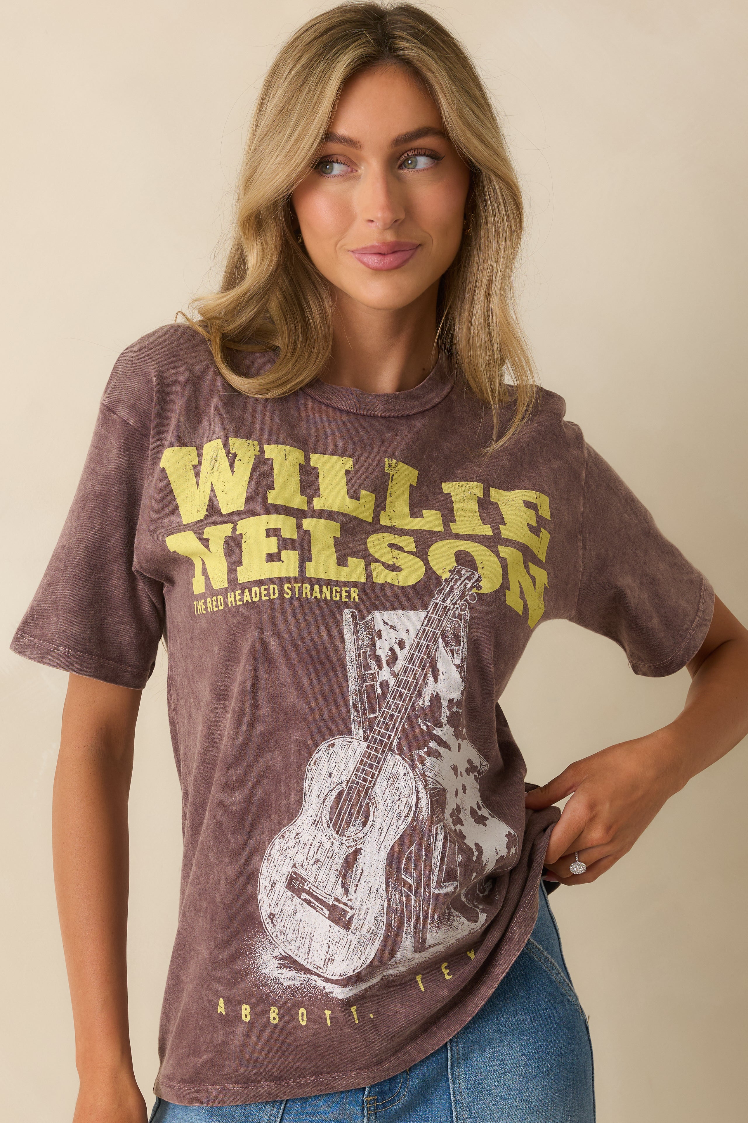 Cropped upper view focusing on the crew neckline and shoulder seam.