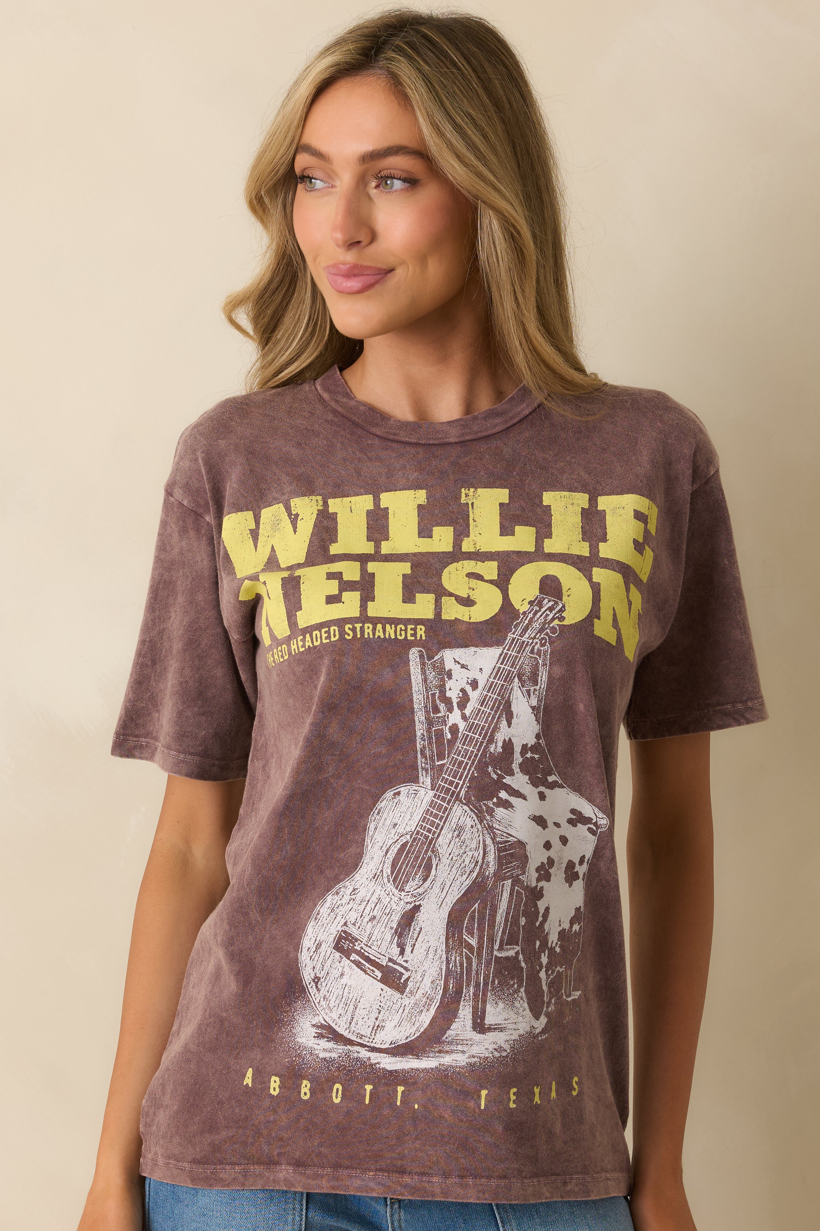 Cropped midsection view emphasizing the “Willie Nelson – Red Headed Stranger” guitar print and Abbott, Texas text.