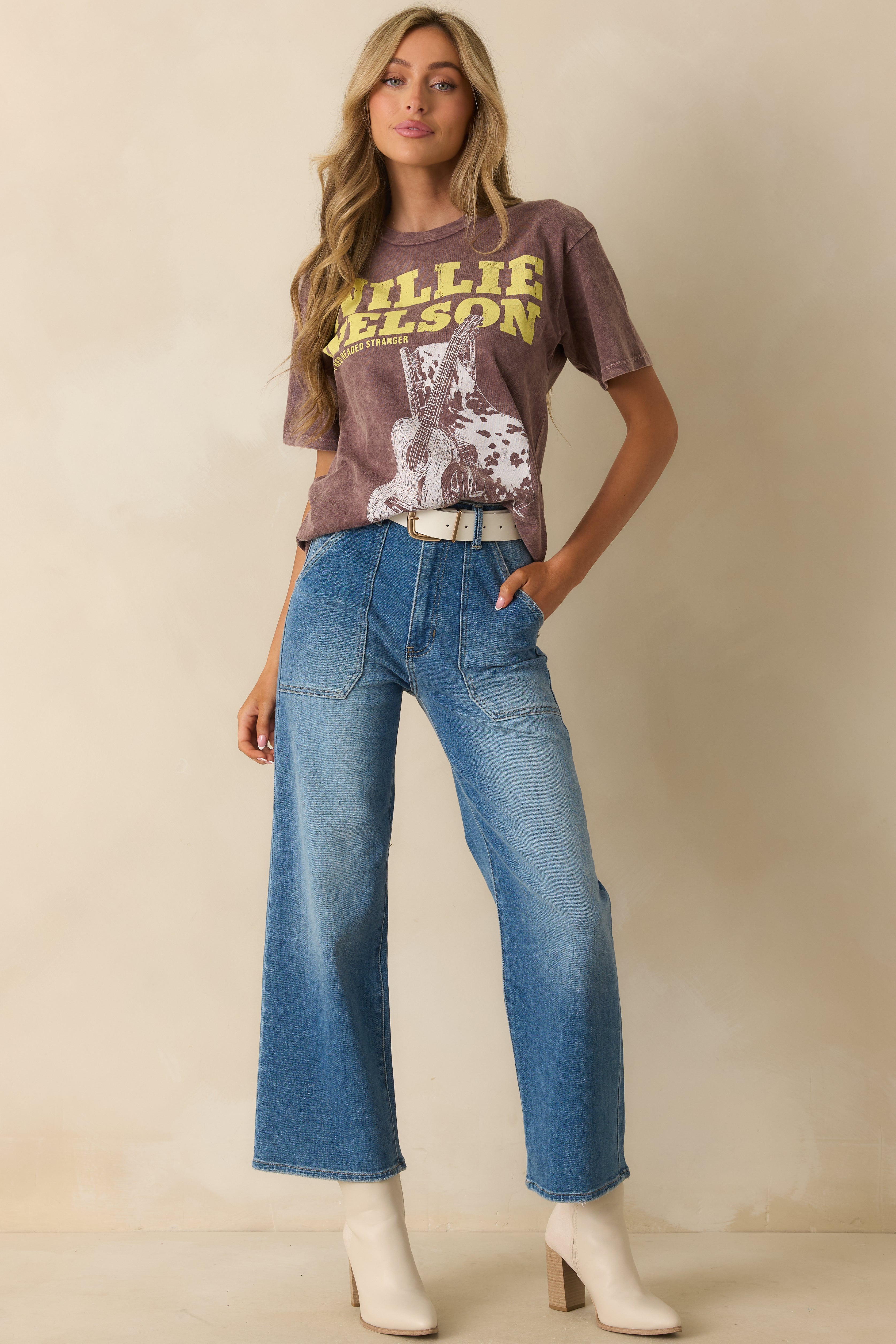 Front-facing view highlighting the distressed vintage wash and full body silhouette.