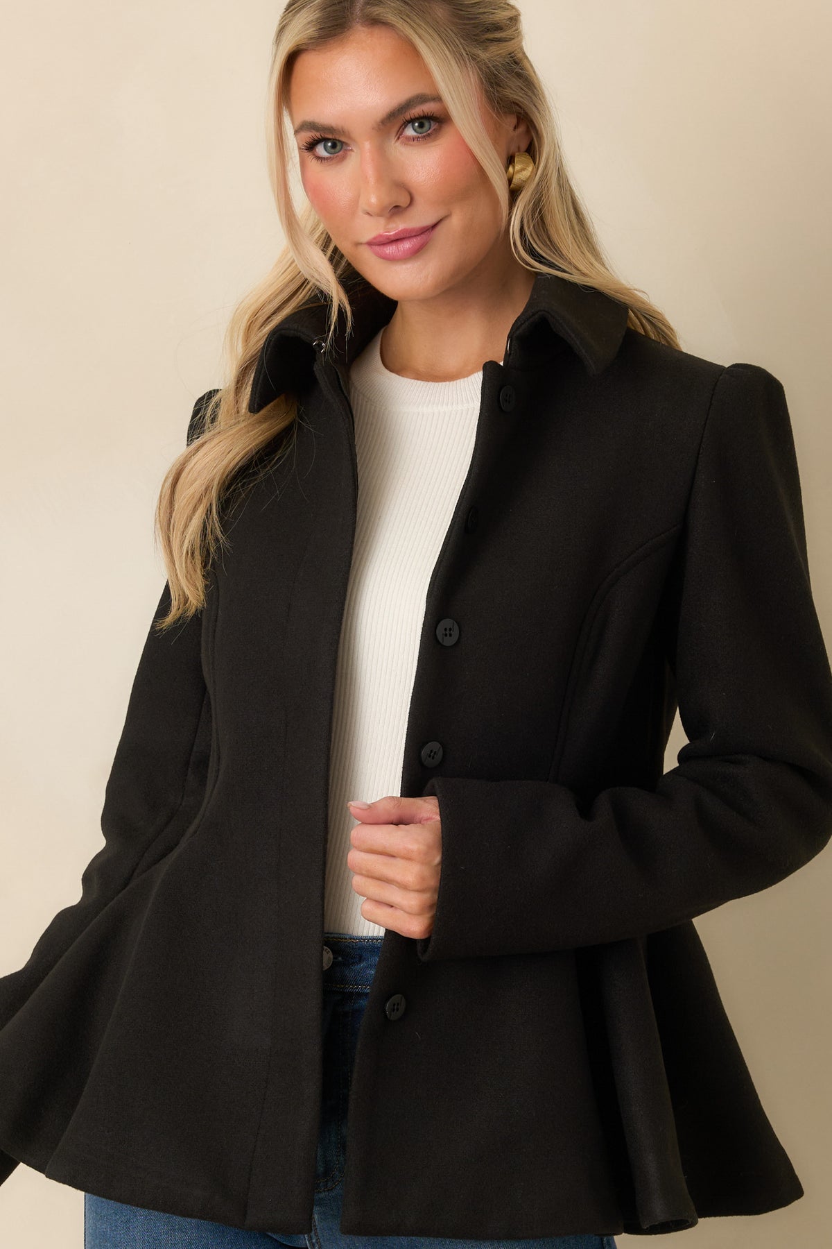 Brushed felt jacket featuring subtly puffed shoulders and long sleeves.