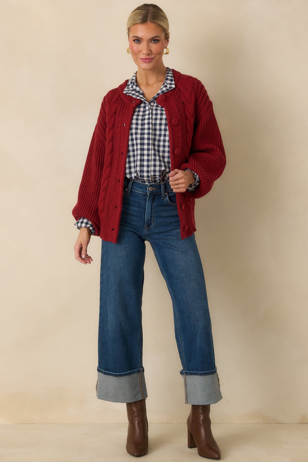 Burgundy cotton-blend cardigan combining chunky front cable detailing with ribbed sleeves, cuffs, and hem.