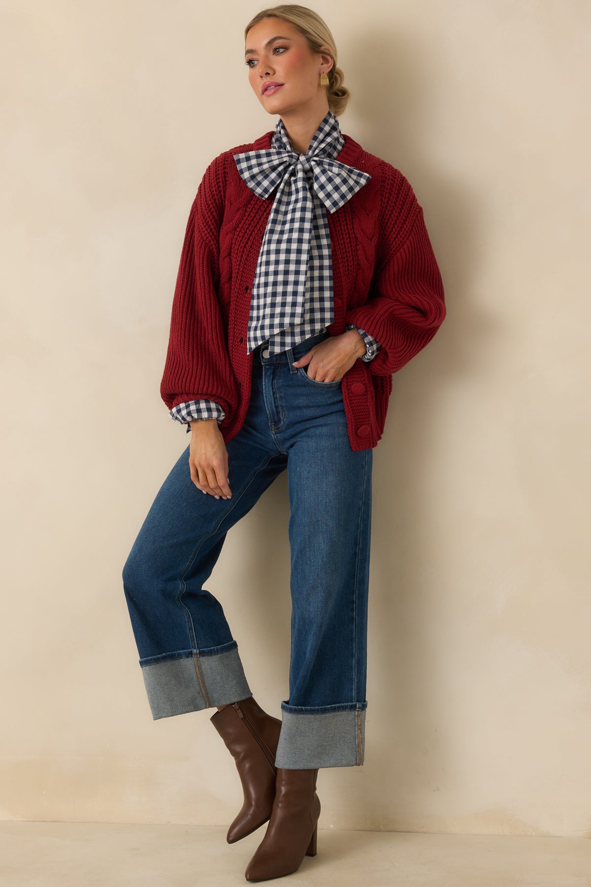 Rich burgundy cardigan featuring a relaxed silhouette, dropped shoulders, and voluminous long sleeves with ribbed cuffs.
