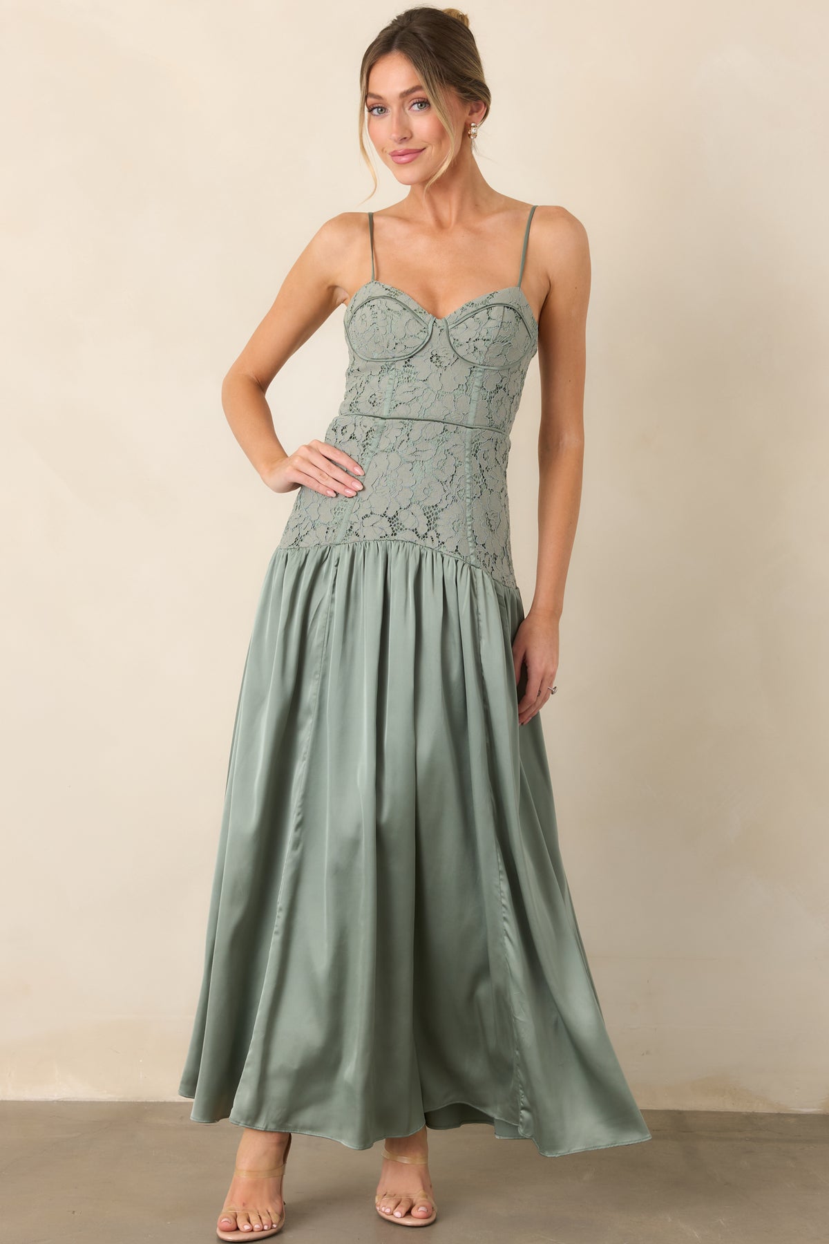 Bustier maxi dress with a defined dropped waist and softly gathered skirt.