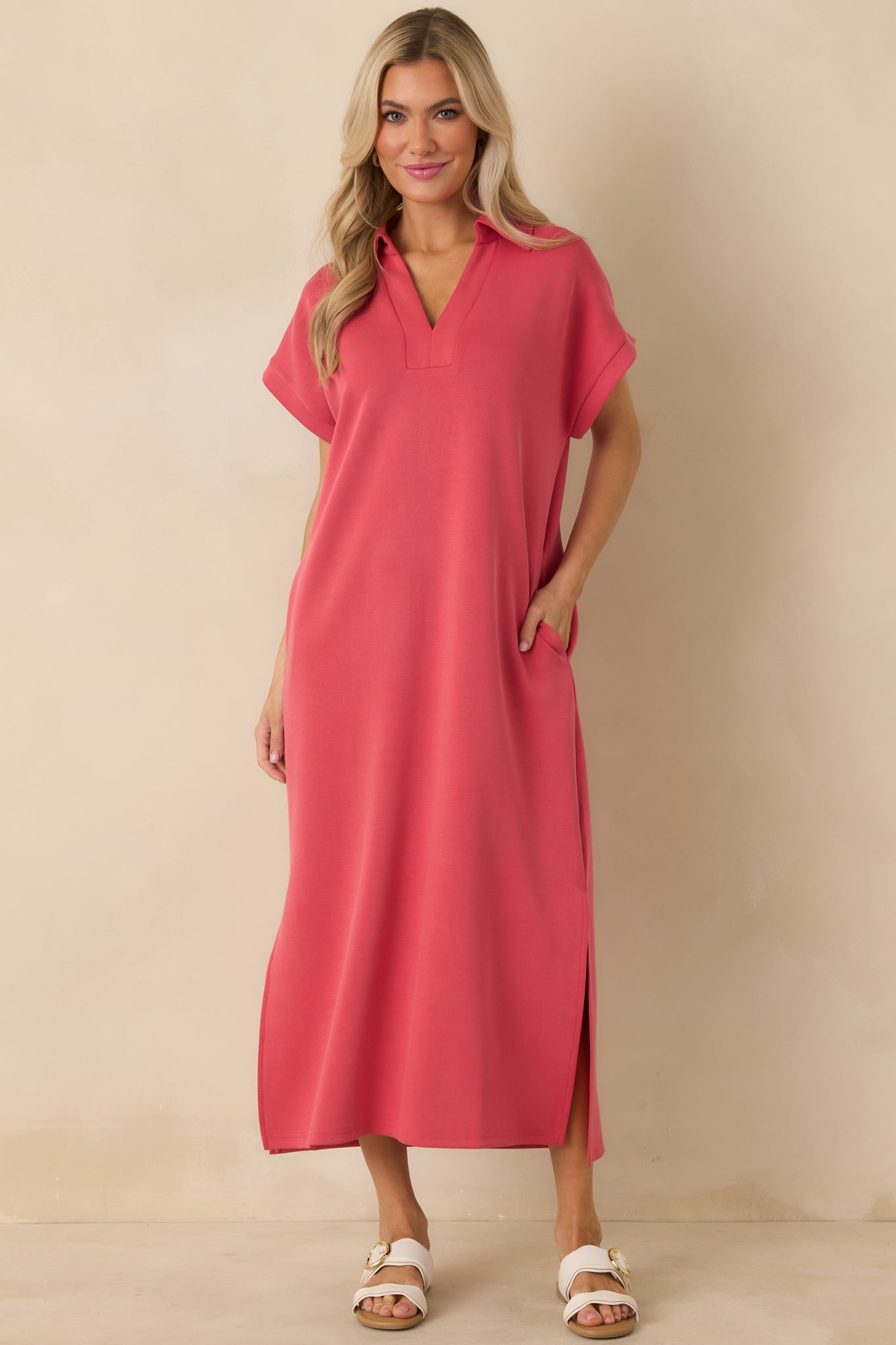 Buttery soft coral pink midi dress featuring a structured collar, notch V-neck, and side vent slits.