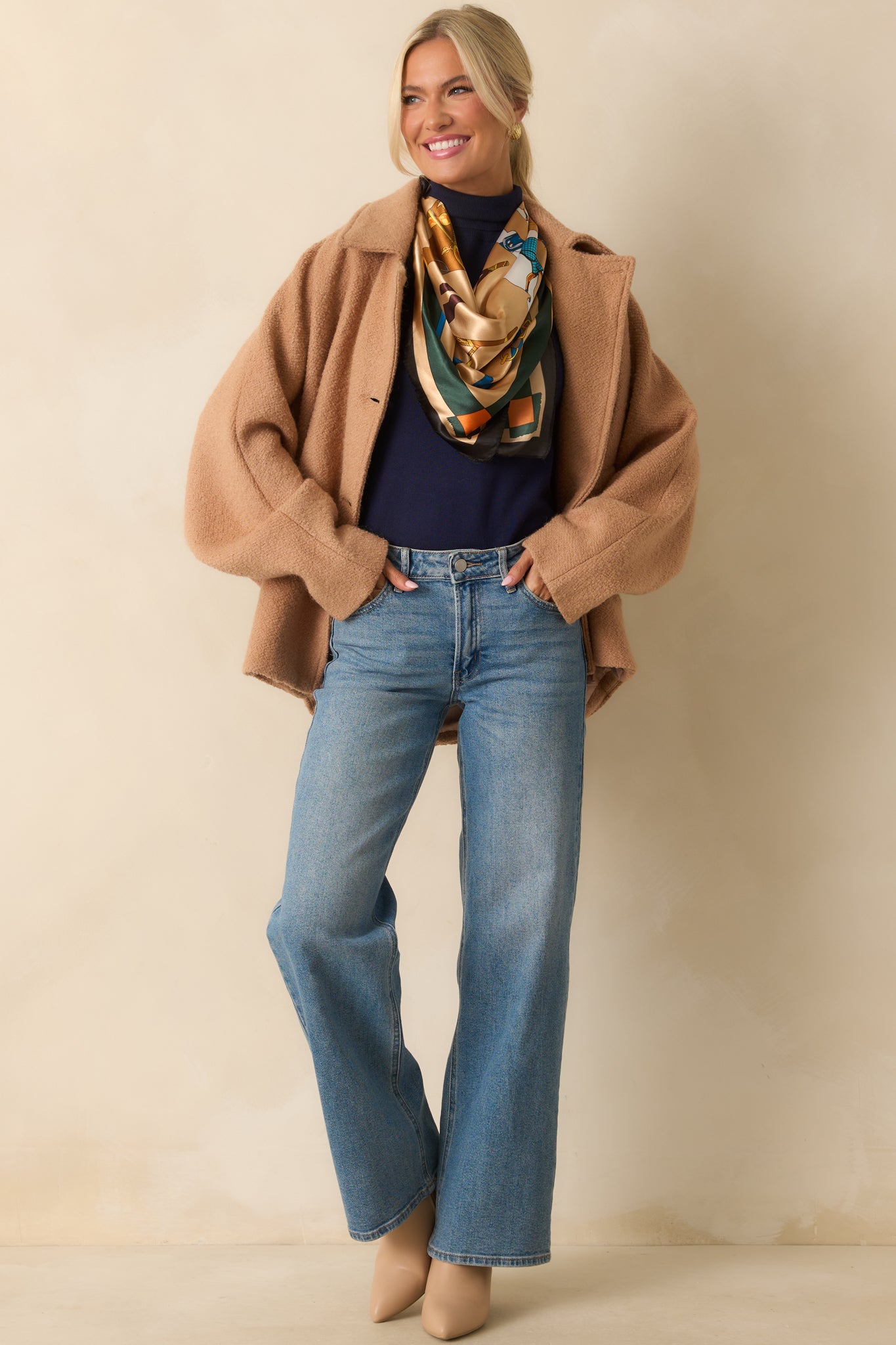 Camel brown wool-blend coat with a collared neckline and straight silhouette.