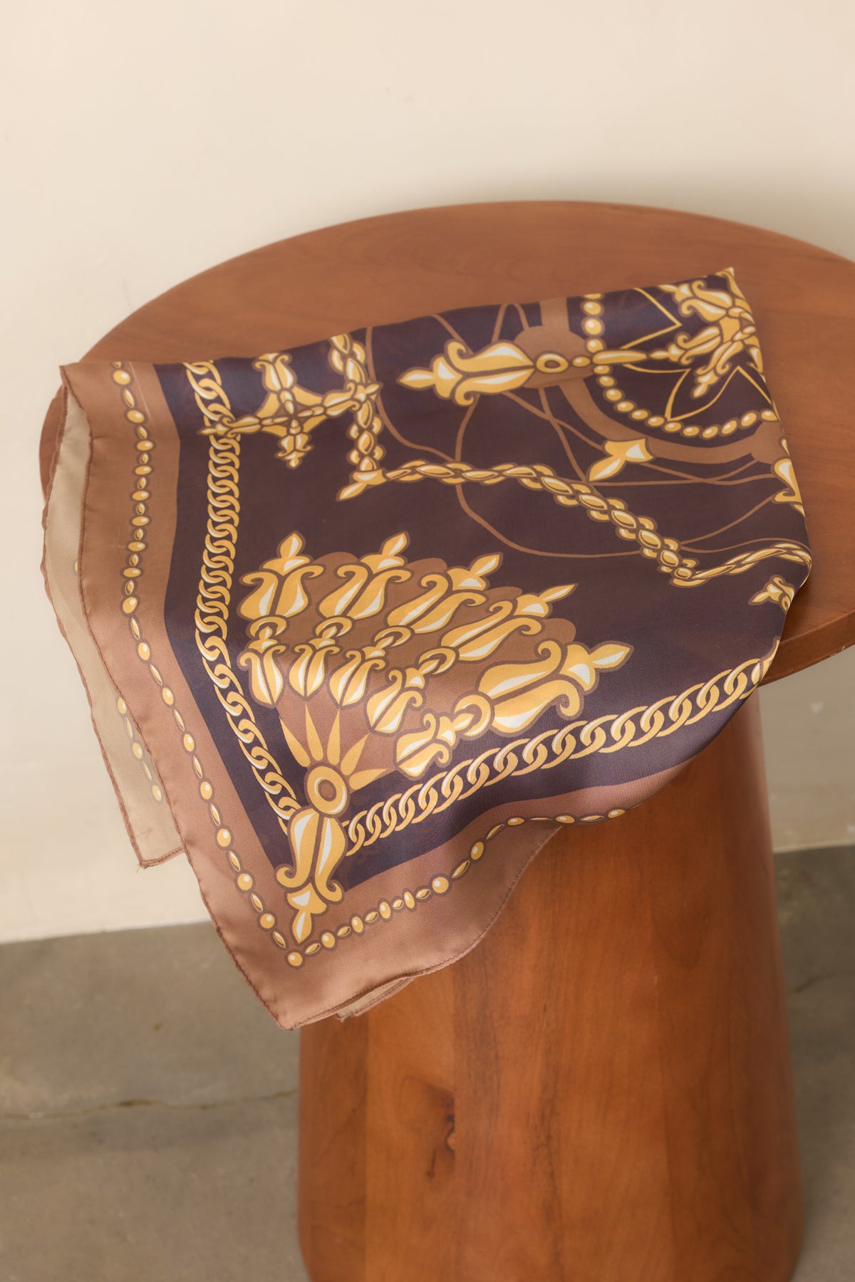 Camel and charcoal grey scarf showcasing the framed print and camel border from the rear.