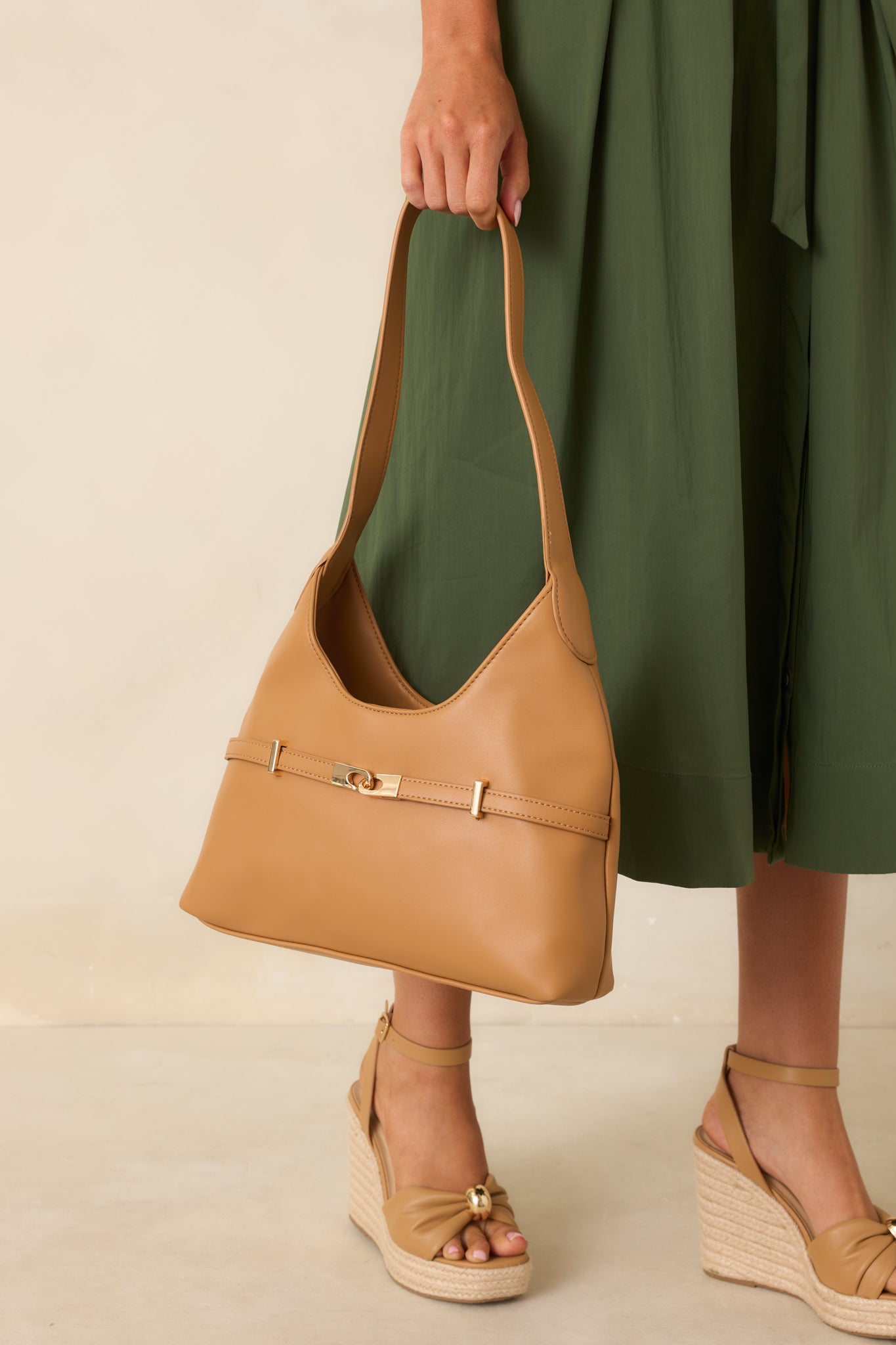 Close-up of the camel shoulder bag featuring smooth faux leather, polished hardware, and elevated minimalist details.