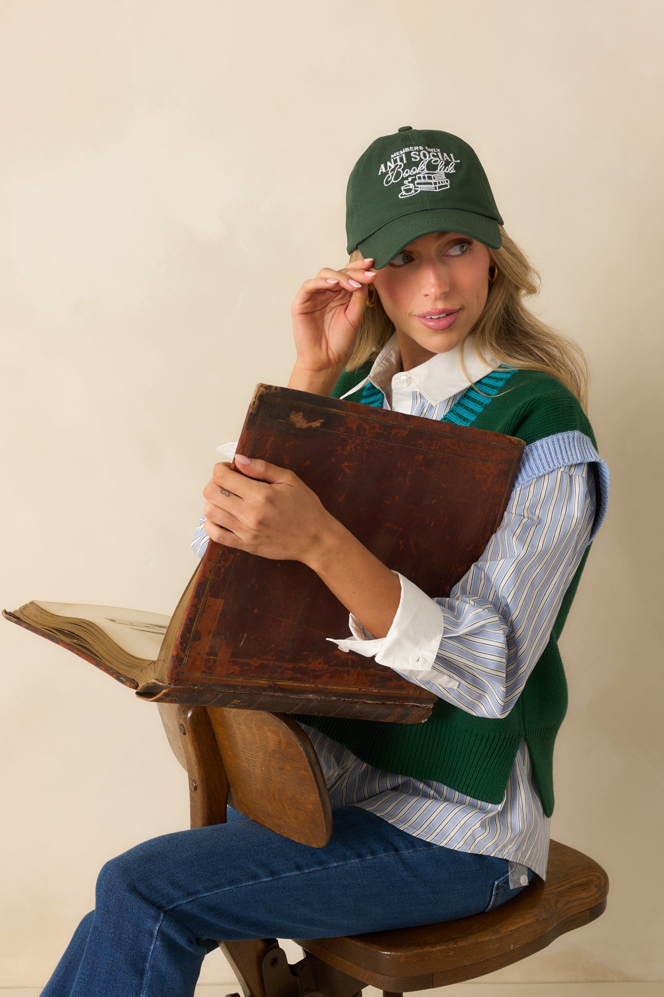 A cropped angled view focusing on the raised embroidery and twill texture.