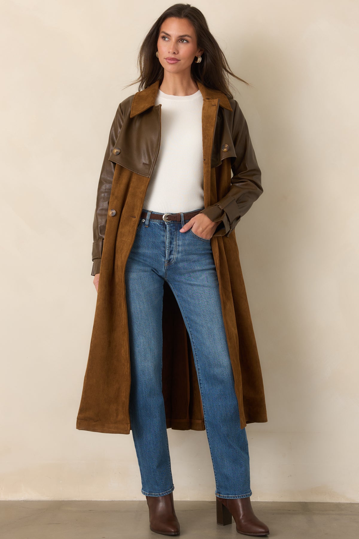 Caramel suede-look coat with wide lapels, smooth brown sleeves, and a defined waist created by the matching belt.