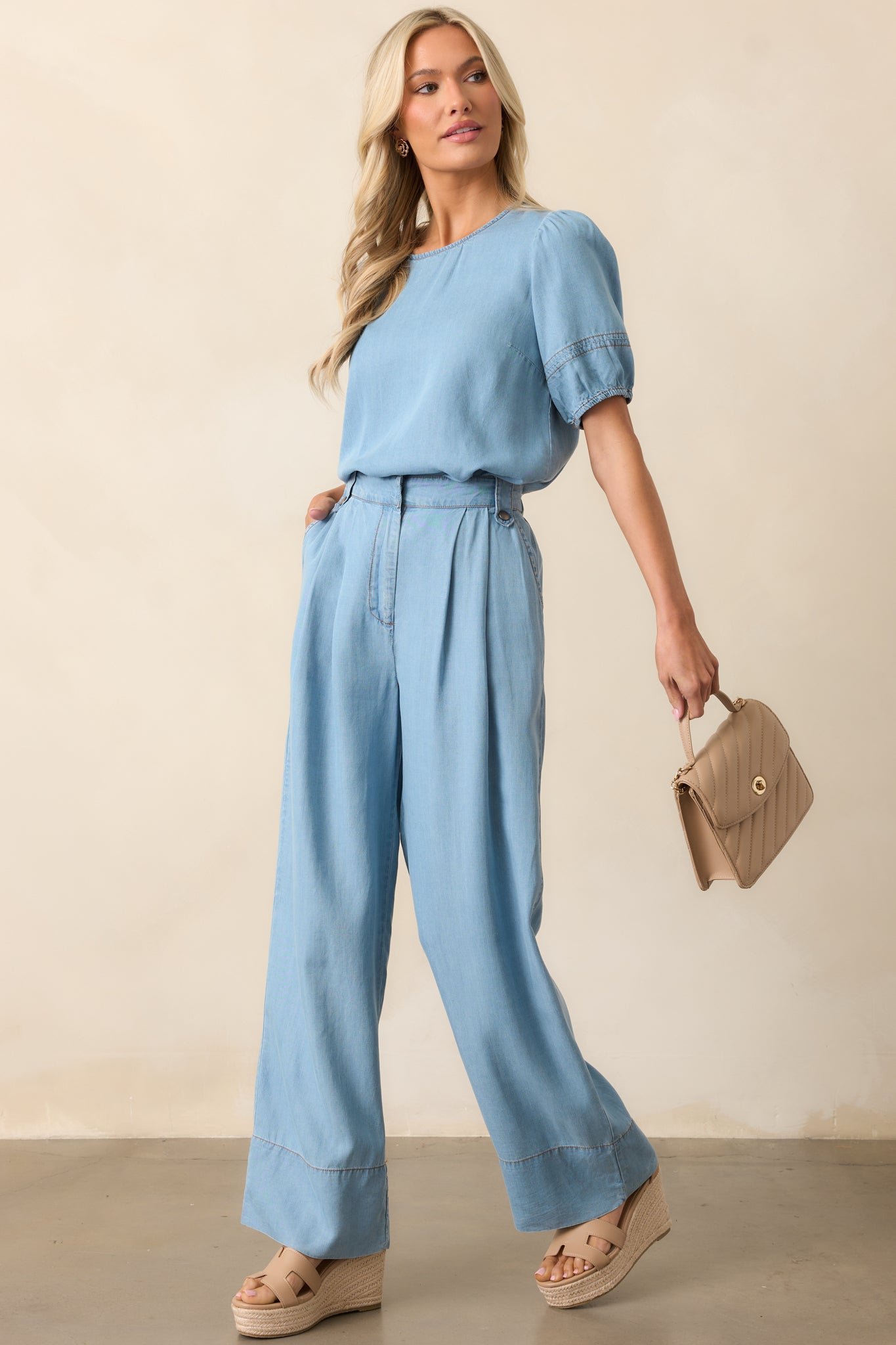 Chambray wide-leg pants with a tailored design, high-rise fit, and a sleek hidden hook and bar closure.