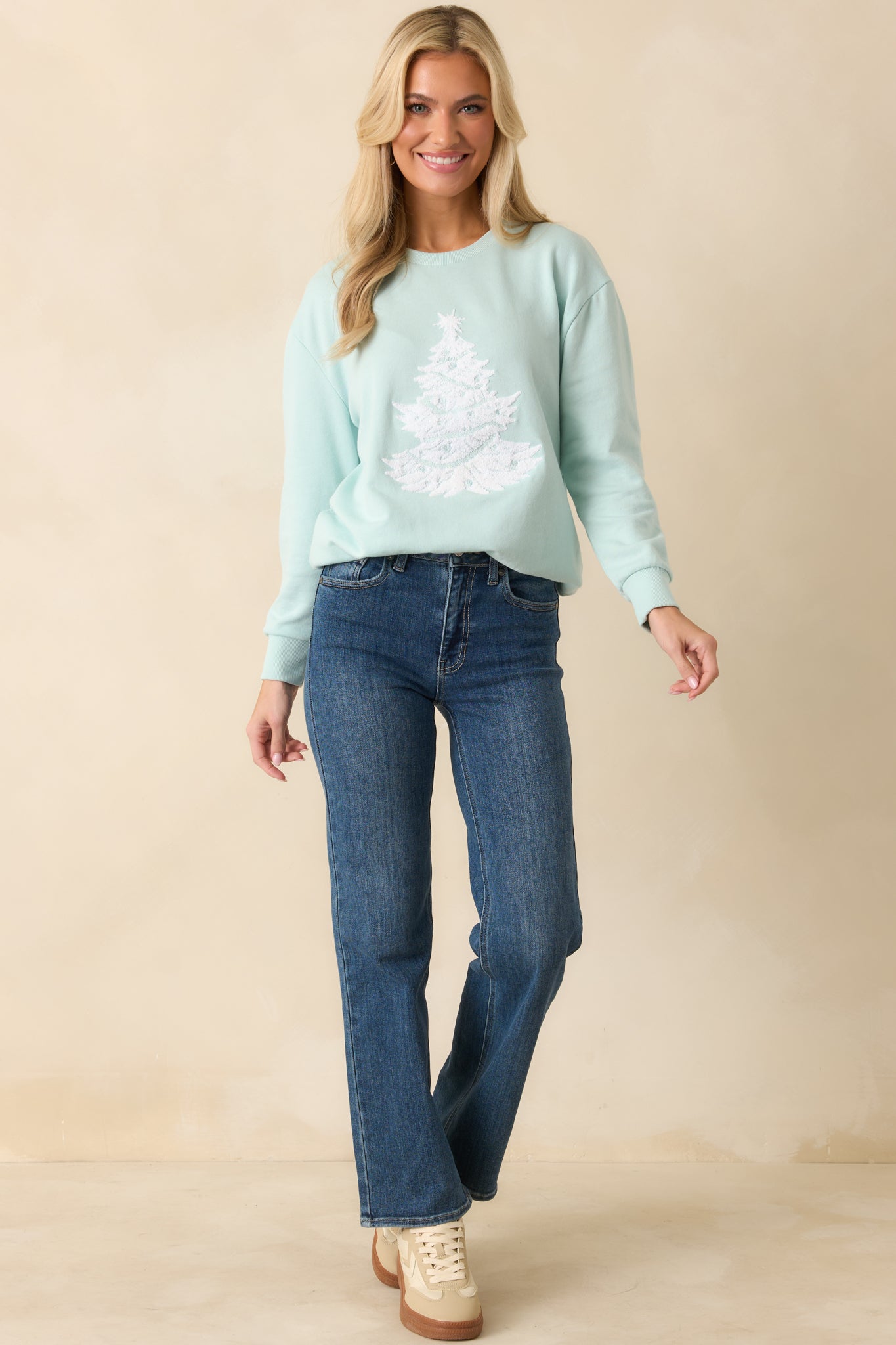 Full-length front view emphasizing the ribbed hem, cuffs, and cozy oversized silhouette.