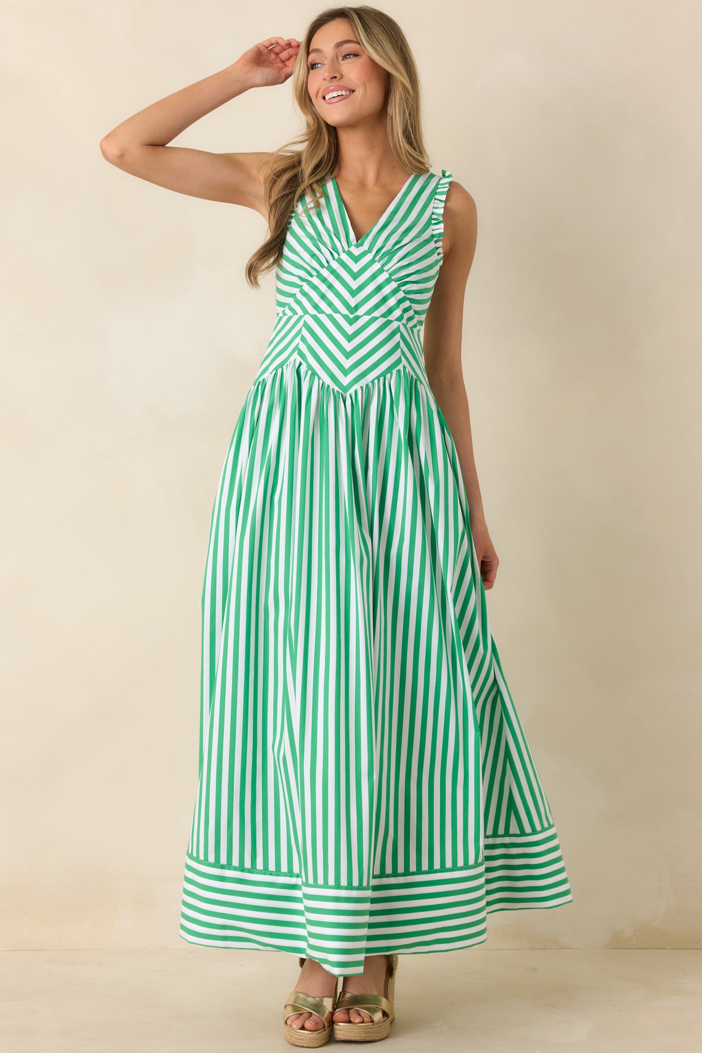 Chevron and vertical stripe midi dress with flattering shape and soft drape.