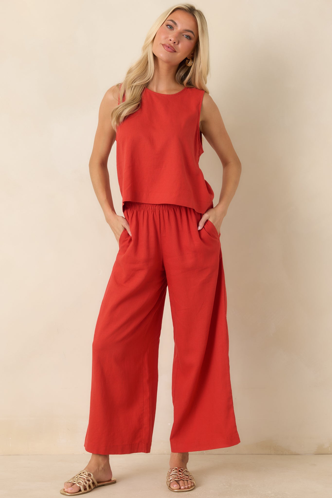 Chili pepper red linen tank top featuring a relaxed boxy silhouette, round neckline, and cropped length.