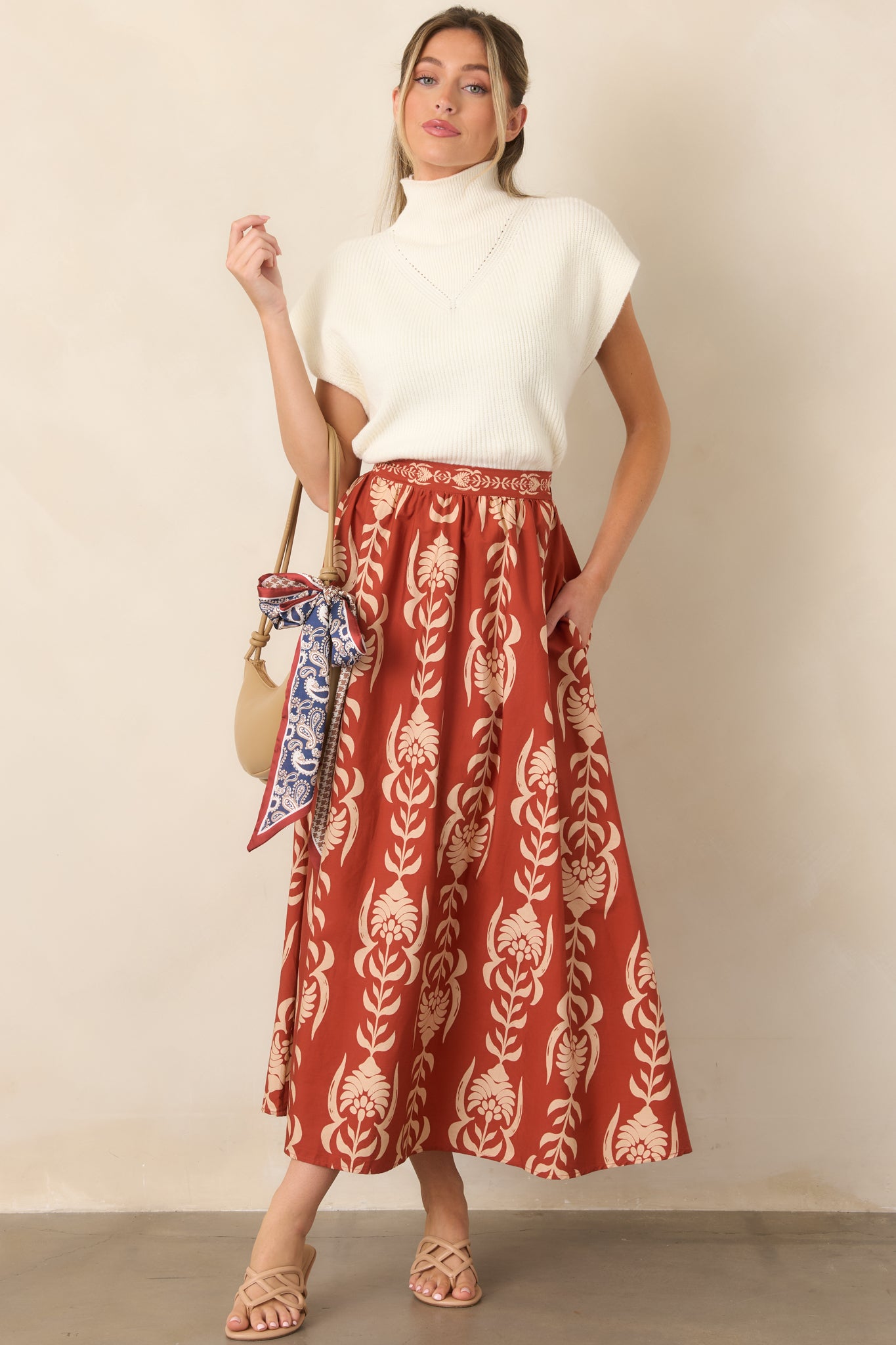 Classic cotton skirt showcasing an effortless A-line silhouette and structured front waistband for a polished finish.