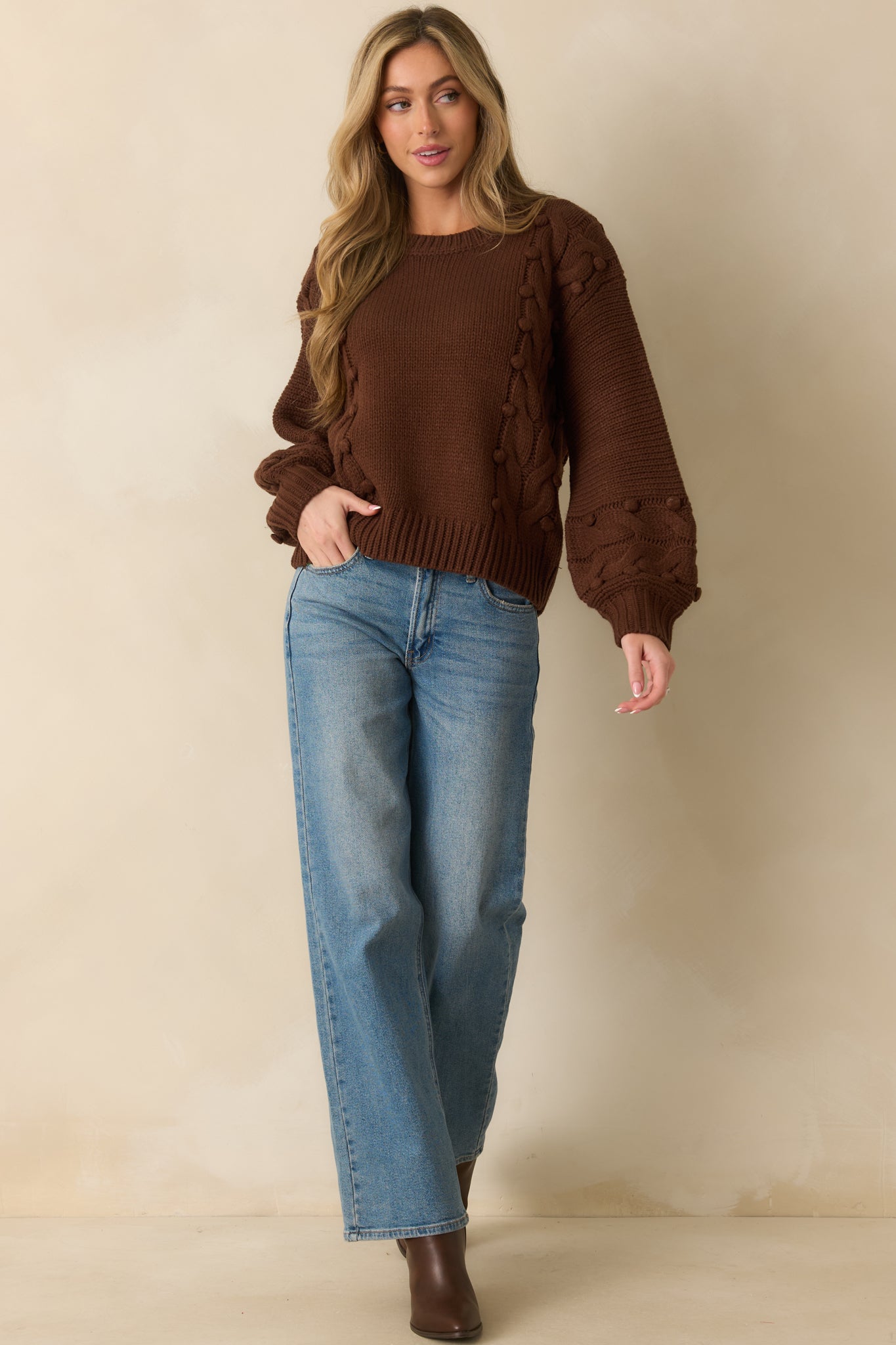 Classic crewneck sweater in deep brown with bobble accents and a chunky knit style
