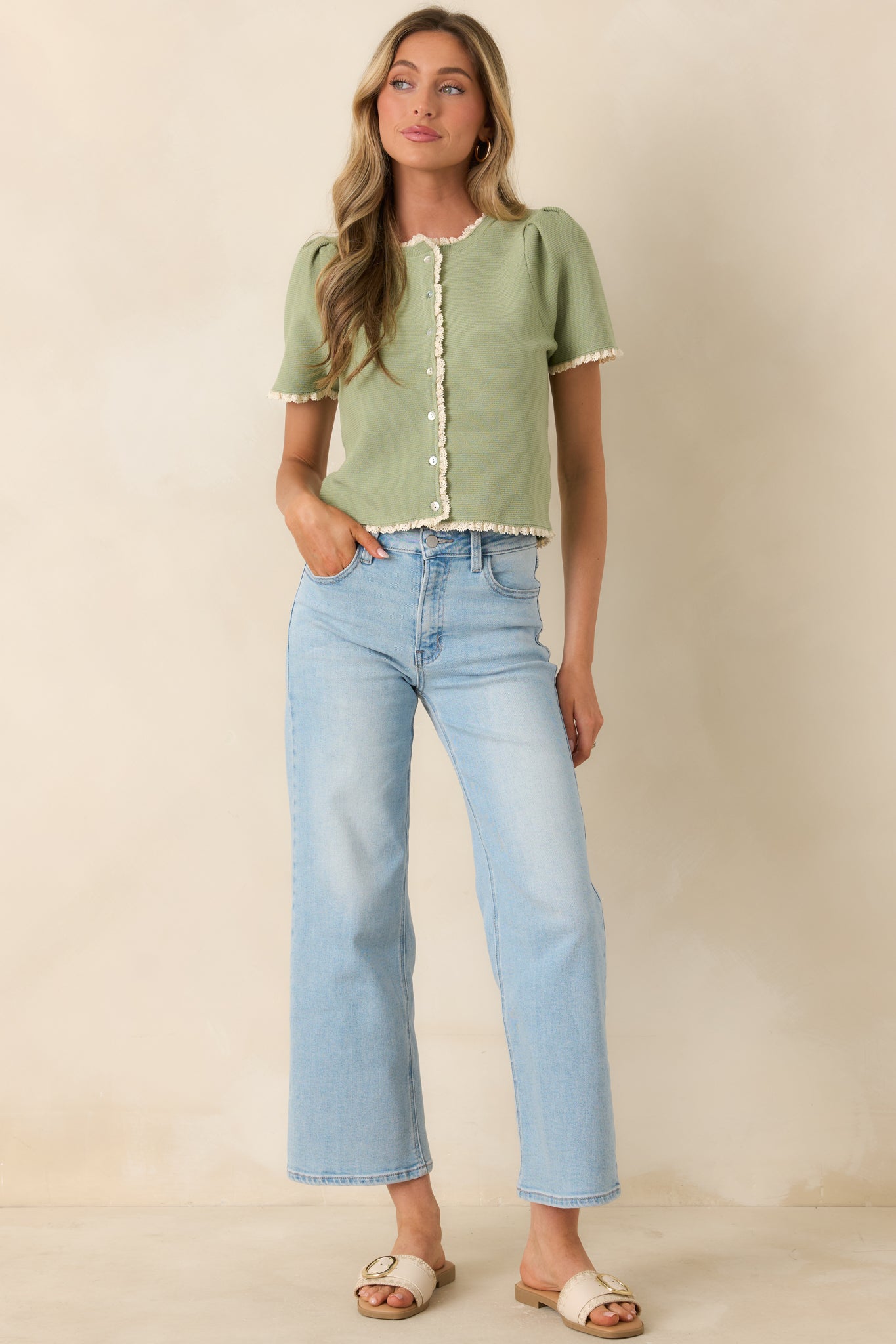 Classic knit top with delicate lace edging and comfortable everyday fit.