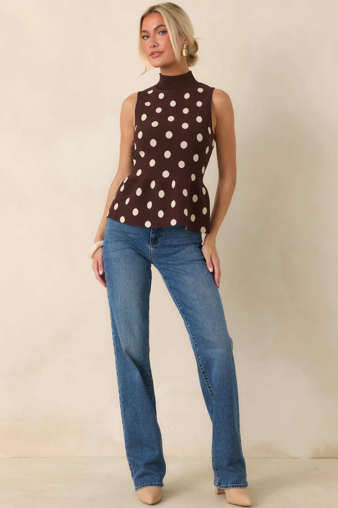 Classic straight-leg pants featuring a structured silhouette and versatile design that pairs effortlessly with a variety of footwear.