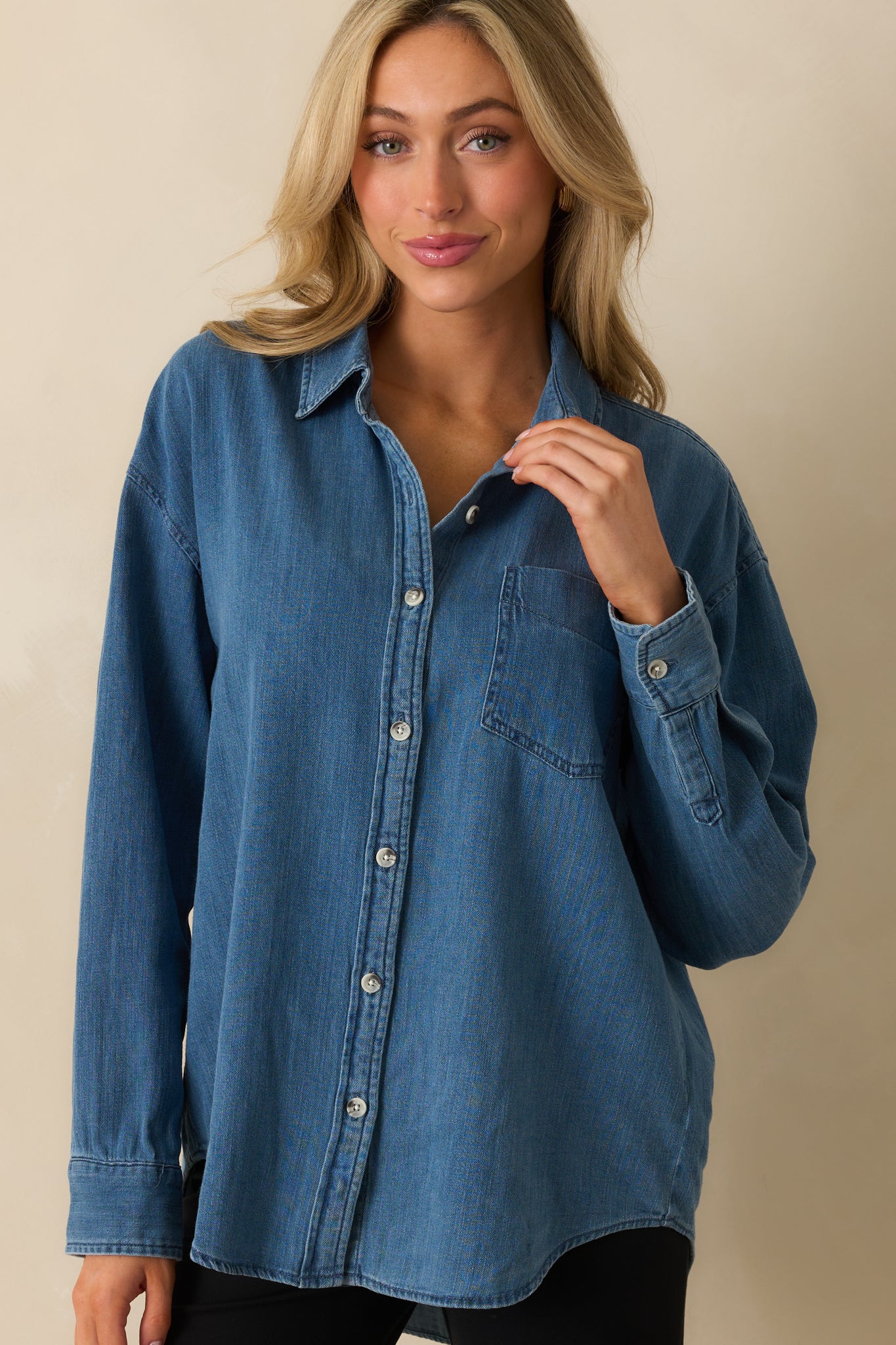 Close look at the functional breast pocket and ribbed button cuffs.