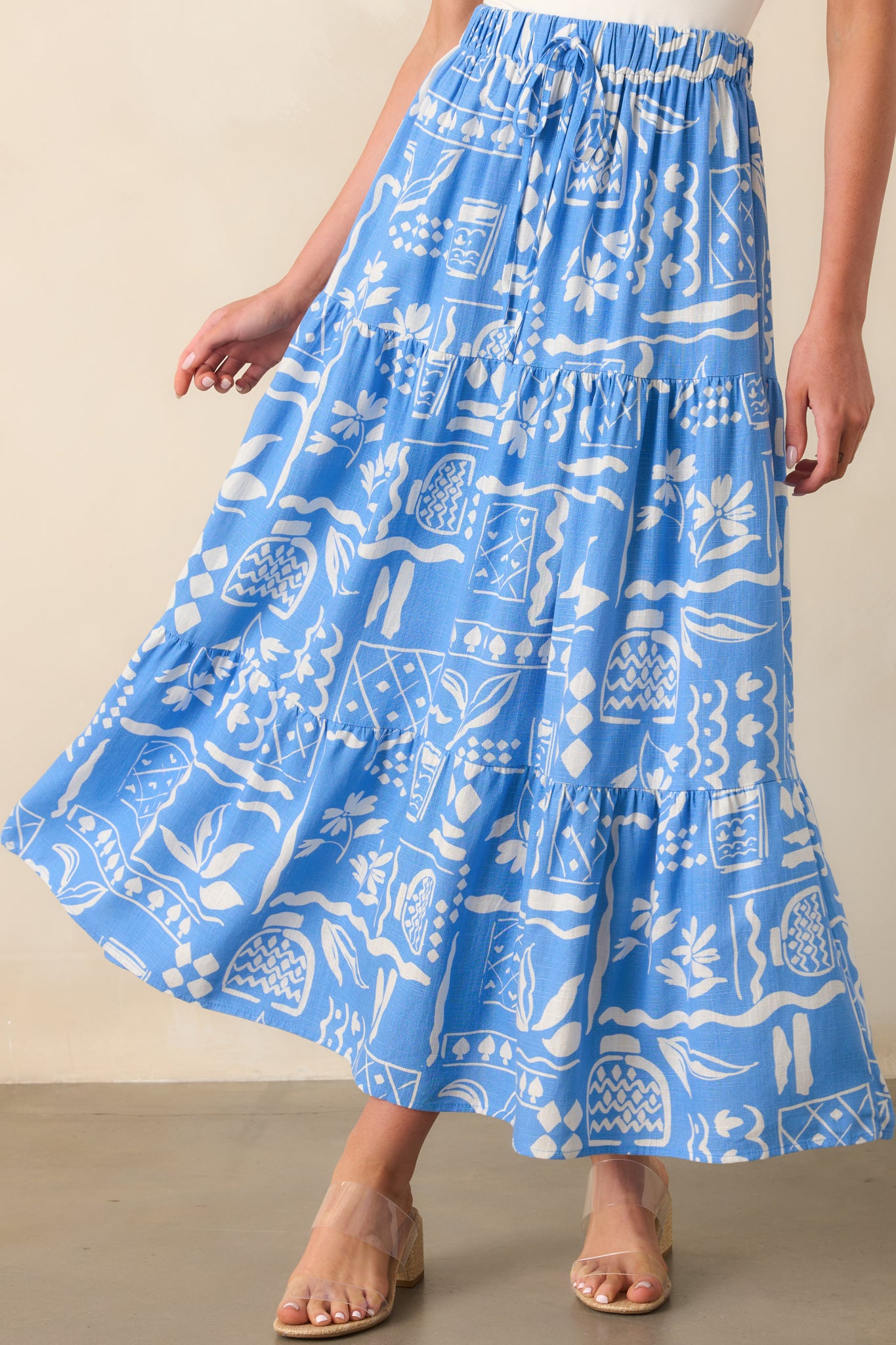 Close-up of the waistband showing the decorative drawstring tie and gathered fabric.