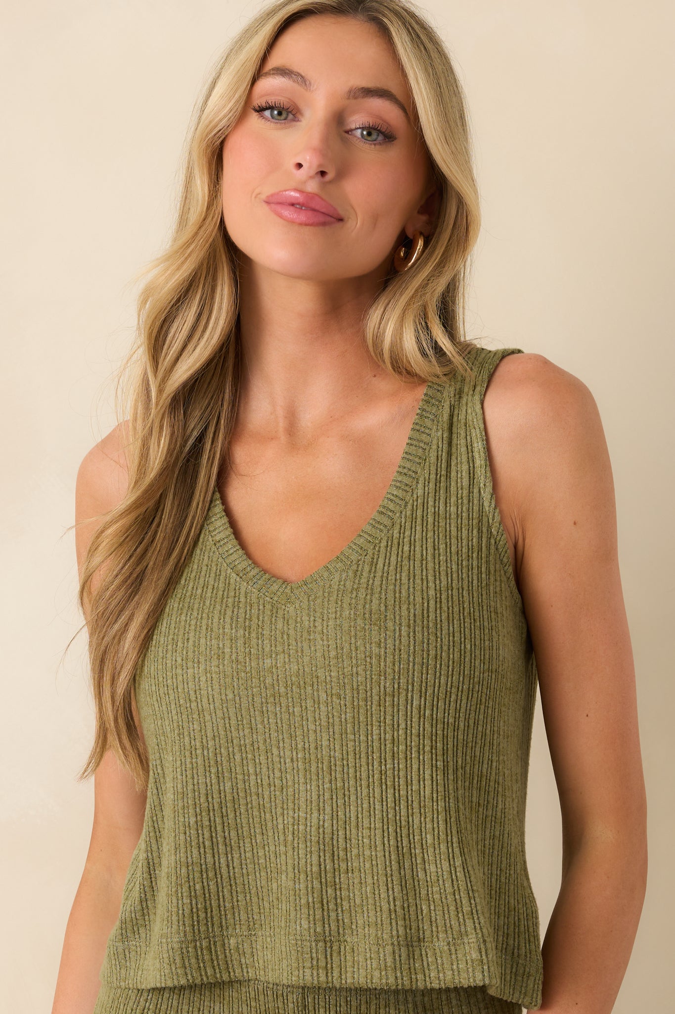 Close-up of the torso area, showing the ribbed texture and relaxed fit.