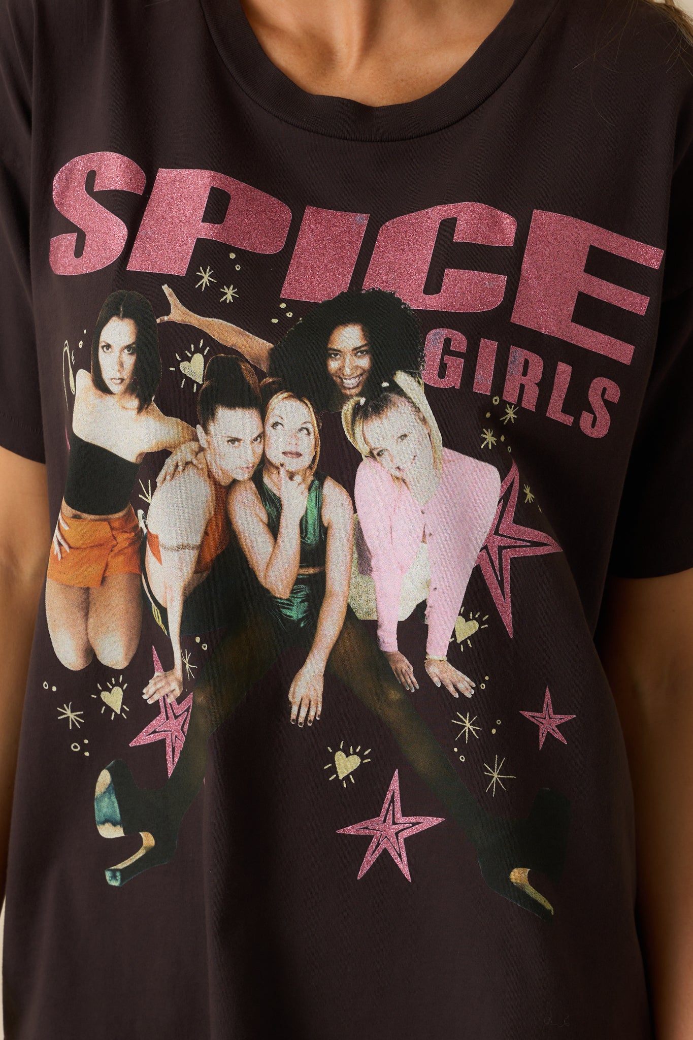 A close-up detail of the pink sparkly accents within the Spice Girls graphic print.