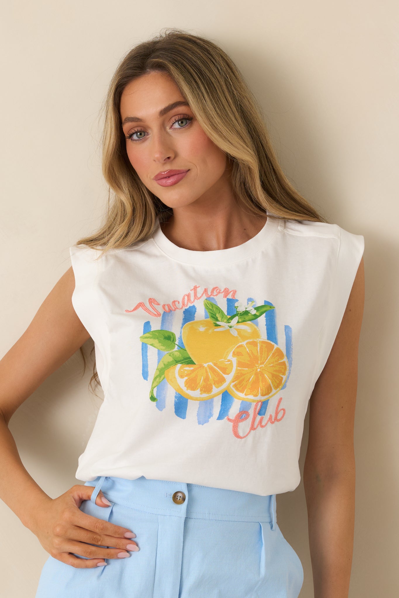 Close view of citrus-inspired graphic detail on soft cotton sleeveless top.